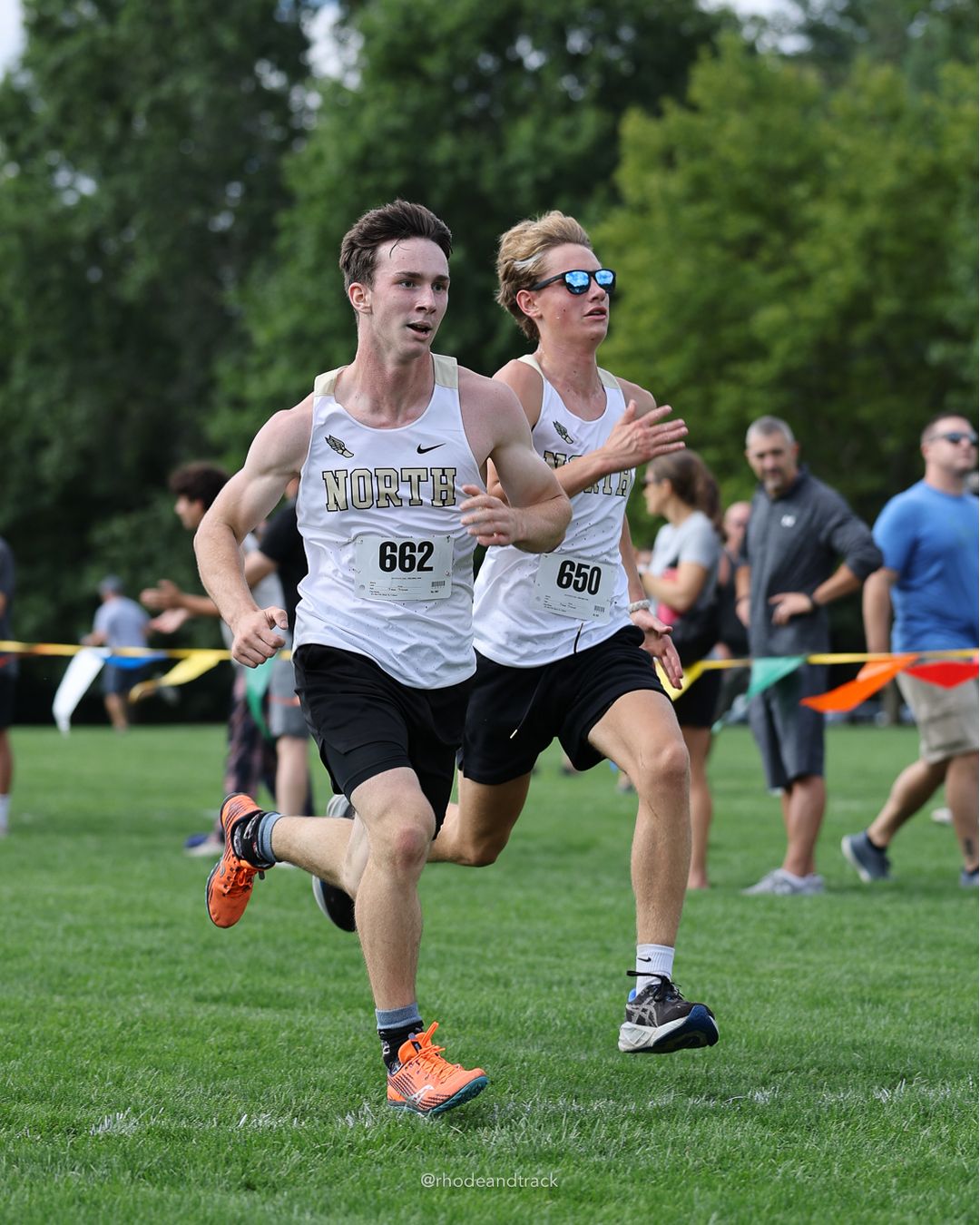 #650 Elliott Graham, North Kingstown High School, 5k Run - Boys (K Johnston), P21, 18:16.29; #662 Henry Mather, North Kingstown High School, 5k Run - Boys (K Johnston), P22, 18:16.59 - #650 Elliott Graham, North Kingstown High School, 5k Run - Boys (K Johnston), P21, 18:16.29 - 2026 Injury Fund Carnival XC - Deerfield Park - Greenville, Rhode Island - September 05, 2026 File: ./dir-3-5k_Run-Boys-K_Johnston/260905-2026-injury-fund-xc-deerfield-park-411-398A8205.jpg #650 Elliott Graham, North Kingstown High School, 5k Run - Boys (K Johnston), P21, 18:16.29; #662 Henry Mather, North Kingstown High School…
