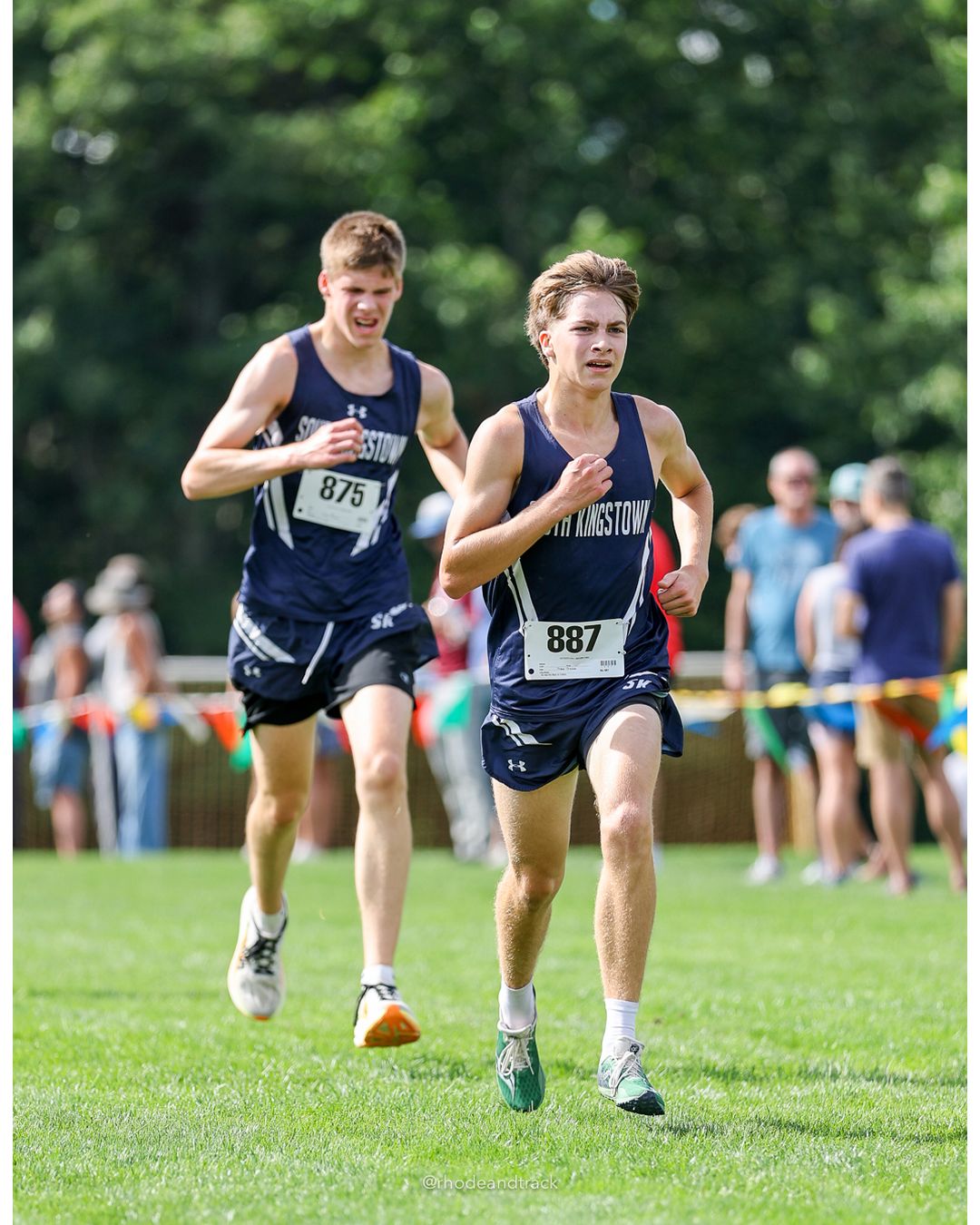 #875 Curtis Delmonico, South Kingstown High School, 5k Run - Boys (K Johnston), P70, 20:53.58; #887 Quentin Blyden, La Salle Academy, 5k Run - Boys (K Johnston), P69, 20:52.50 - #875 Curtis Delmonico, South Kingstown High School, 5k Run - Boys (K Johnston), P70, 20:53.58; #887 Quentin Blyden, La Salle Academy, 5k Run - Boys (K Johnston), P69, 20:52.50 - 2026 Injury Fund Carnival XC - Deerfield Park - Greenville, Rhode Island - September 05, 2026 File: ./dir-3-5k_Run-Boys-K_Johnston/260905-2026-injury-fund-xc-deerfield-park-460-398A8847.jpg #875 Curtis Delmonico, South Kingstown High School, 5k Run - Boys (K Johnston), P70, 20:53.58; #887 Quentin Blyden, La Salle Academy, 5k Ru…