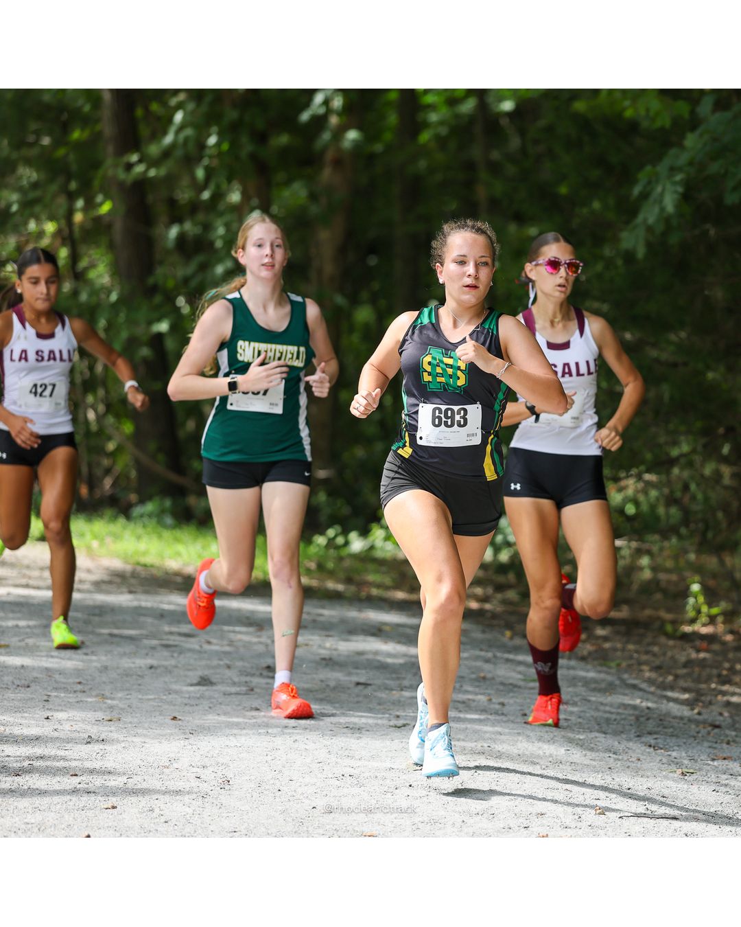 #693 Brielle Baillargeon, North Smithfield High School, 5k Run - Girls (Hindley), P18, 23:22.27; #427 Sabrina Ghamrawi, La Salle Academy, 5k Run - Girls (Hindley), P3, 20:03.94 - 2026 Injury Fund Carnival XC - Deerfield Park - Greenville, Rhode Island - September 05, 2026 File: ./dir-4-5k_Run-Girls-Hindley/260905-2026-injury-fund-xc-deerfield-park-517-398A9749.jpg #693 Brielle Baillargeon, North Smithfield High School, 5k Run - Girls (Hindley), P18, 23:22.27; #427 Sabrina Ghamrawi, La Salle Academy, 5…