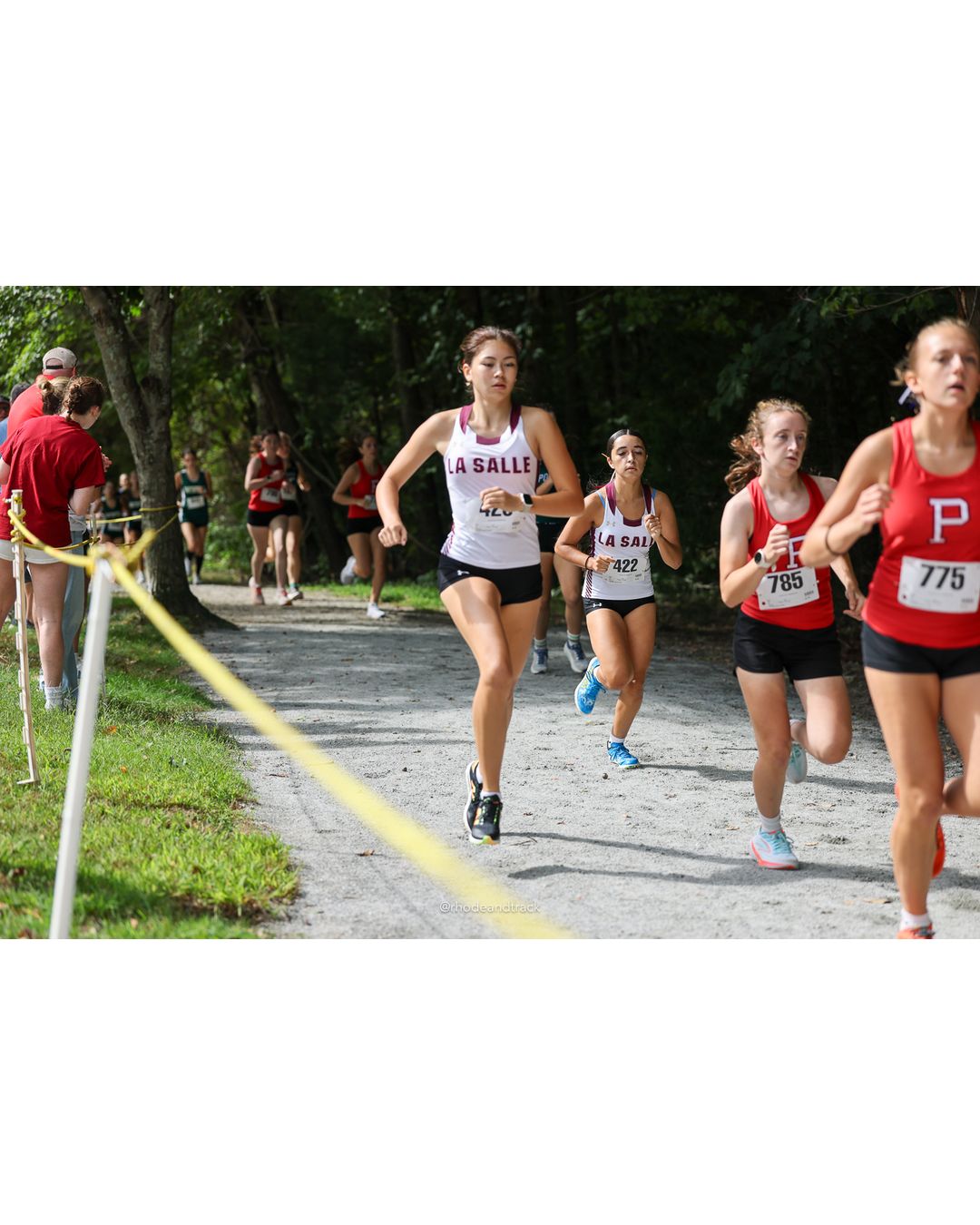#775 Annika Aboyoun Stein, Portsmouth High School, 5k Run - Girls (Hindley), P21, 24:15.38; #785 Emily Perry, Portsmouth High School, 5k Run - Girls (Hindley), P20, 23:48.57; #422 Nyla Crespo, La Salle Academy, 5k Run - Girls (Hindley), P19, 23:23.05 - #775 Annika Aboyoun Stein, Portsmouth High School, 5k Run - Girls (Hindley), P21, 24:15.38; #785 Emily Perry, Portsmouth High School, 5k Run - Girls (Hindley), P20, 23:48.57; #422 Nyla Crespo, La Salle Academy, 5k Run - Girls (Hindley), P19, 23:23.05 - 2026 Injury Fund Carnival XC - Deerfield Park - Greenville, Rhode Island - September 05, 2026 File: ./dir-4-5k_Run-Girls-Hindley/260905-2026-injury-fund-xc-deerfield-park-524-398A9928.jpg #775 Annika Aboyoun Stein, Portsmouth High School, 5k Run - Girls (Hindley), P21, 24:15.38; #785 Emily Perry, Portsmouth High School, 5k Ru…