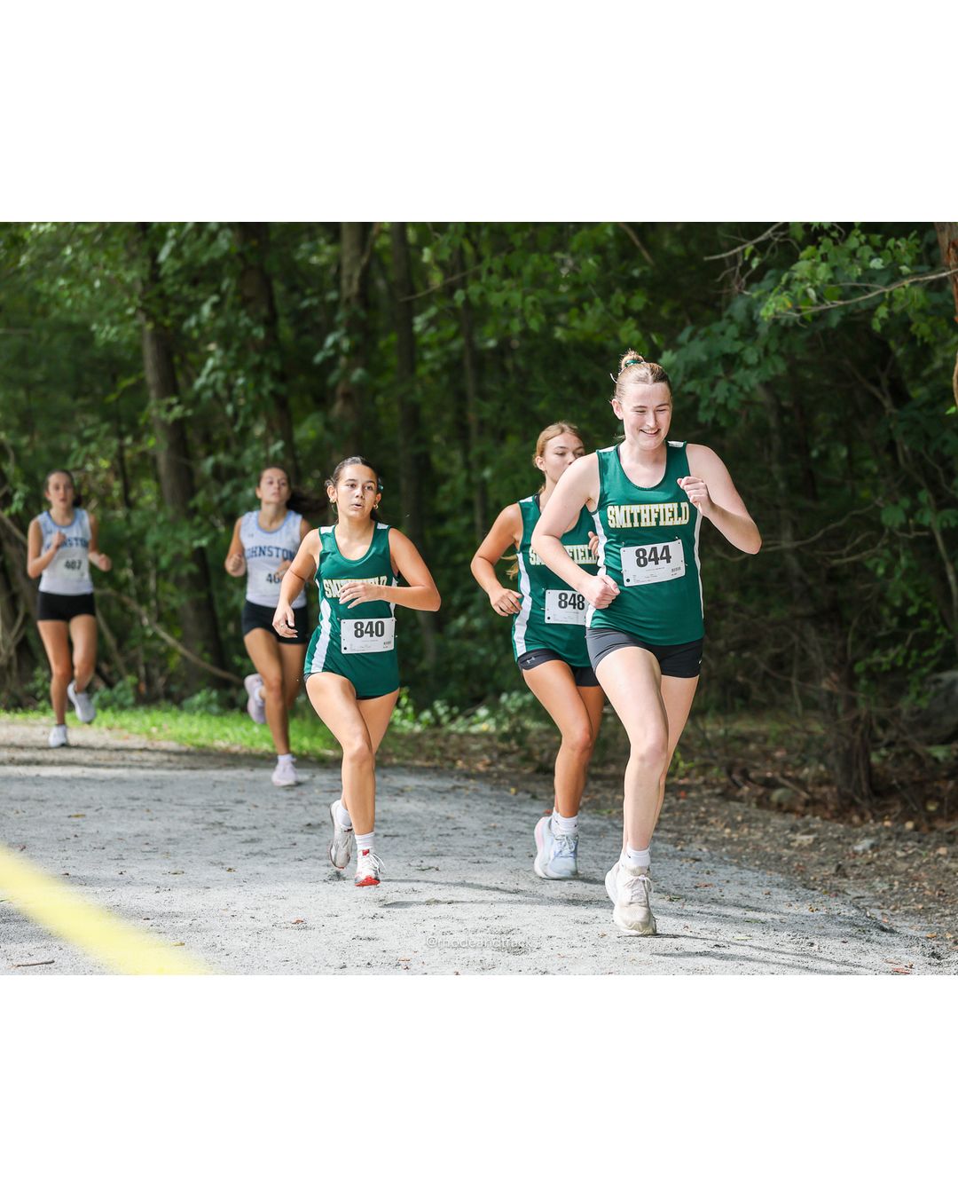 #844 Annabelle Lally, Smithfield High School, 5k Run - Girls (Hindley), P32, 26:09.98; #840 Tiana Cost, Smithfield High School, 5k Run - Girls (Hindley), P30, 25:10.11; #848 Emma Tuetken, Smithfield High School, 5k Run - Girls (Hindley), P29, 25:04.30 - #840 Tiana Cost, Smithfield High School, 5k Run - Girls (Hindley), P30, 25:10.11 - 2026 Injury Fund Carnival XC - Deerfield Park - Greenville, Rhode Island - September 05, 2026 File: ./dir-4-5k_Run-Girls-Hindley/260905-2026-injury-fund-xc-deerfield-park-530-398A9991.jpg #844 Annabelle Lally, Smithfield High School, 5k Run - Girls (Hindley), P32, 26:09.98; #840 Tiana Cost, Smithfield High School, 5k Run - Gi…