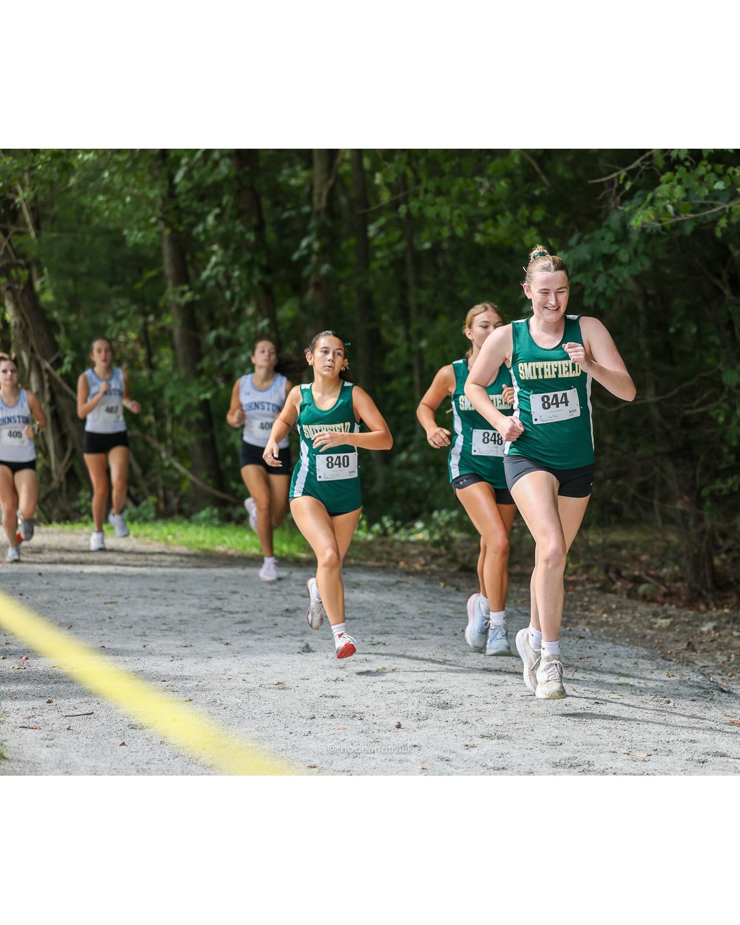 #844 Annabelle Lally, Smithfield High School, 5k Run - Girls (Hindley), P32, 26:09.98; #840 Tiana Cost, Smithfield High School, 5k Run - Girls (Hindley), P30, 25:10.11; #848 Emma Tuetken, Smithfield High School, 5k Run - Girls (Hindley), P29, 25:04.30 - #840 Tiana Cost, Smithfield High School, 5k Run - Girls (Hindley), P30, 25:10.11; #848 Emma Tuetken, Smithfield High School, 5k Run - Girls (Hindley), P29, 25:04.30 - 2026 Injury Fund Carnival XC - Deerfield Park - Greenville, Rhode Island - September 05, 2026 File: ./dir-4-5k_Run-Girls-Hindley/260905-2026-injury-fund-xc-deerfield-park-531-398A9992.jpg #844 Annabelle Lally, Smithfield High School, 5k Run - Girls (Hindley), P32, 26:09.98; #840 Tiana Cost, Smithfield High School, 5k Run - Gi…