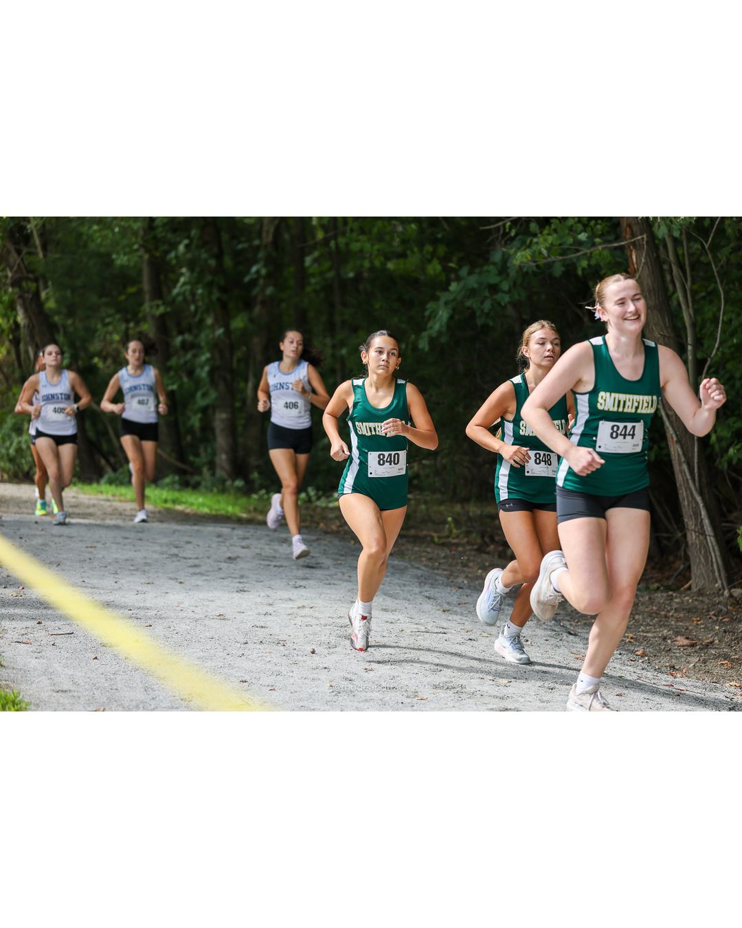 #844 Annabelle Lally, Smithfield High School, 5k Run - Girls (Hindley), P32, 26:09.98; #840 Tiana Cost, Smithfield High School, 5k Run - Girls (Hindley), P30, 25:10.11; #848 Emma Tuetken, Smithfield High School, 5k Run - Girls (Hindley), P29, 25:04.30 - #844 Annabelle Lally, Smithfield High School, 5k Run - Girls (Hindley), P32, 26:09.98; #848 Emma Tuetken, Smithfield High School, 5k Run - Girls (Hindley), P29, 25:04.30; #840 Tiana Cost, Smithfield High School, 5k Run - Girls (Hindley), P30, 25:10.11 - 2026 Injury Fund Carnival XC - Deerfield Park - Greenville, Rhode Island - September 05, 2026 File: ./dir-4-5k_Run-Girls-Hindley/260905-2026-injury-fund-xc-deerfield-park-532-398A9995.jpg #844 Annabelle Lally, Smithfield High School, 5k Run - Girls (Hindley), P32, 26:09.98; #840 Tiana Cost, Smithfield High School, 5k Run - Gi…