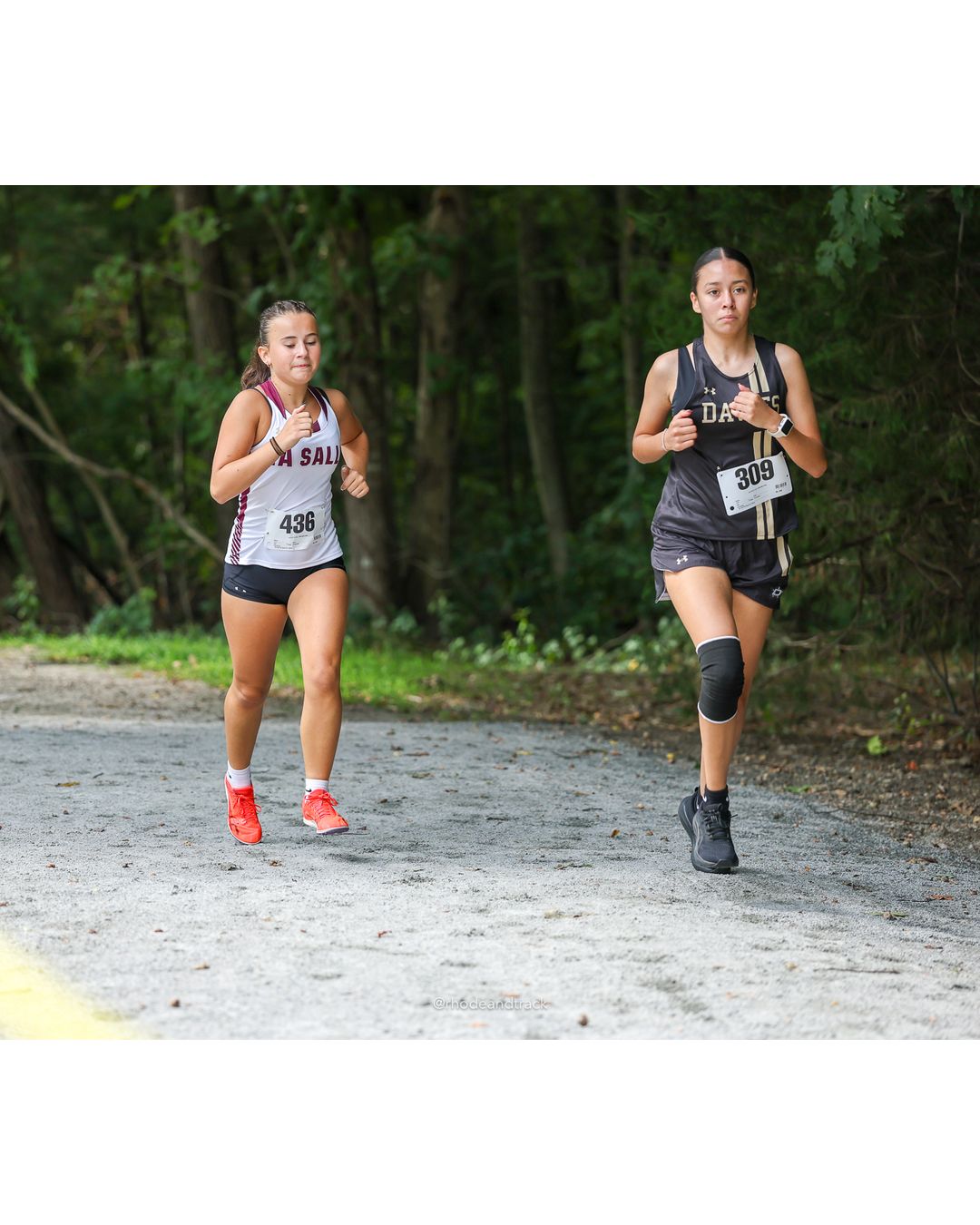 #309 Nayeli Lopes, Davies High School, 5k Run - Girls (Hindley), P51, 33:21.55; #436 Josephine Rozen, La Salle Academy, 5k Run - Girls (Hindley), P38, 28:14.44 - #309 Nayeli Lopes, Davies High School, 5k Run - Girls (Hindley), P51, 33:21.55; #436 Josephine Rozen, La Salle Academy, 5k Run - Girls (Hindley), P38, 28:14.44 - 2026 Injury Fund Carnival XC - Deerfield Park - Greenville, Rhode Island - September 05, 2026 File: ./dir-4-5k_Run-Girls-Hindley/260905-2026-injury-fund-xc-deerfield-park-537-398A0073.jpg #309 Nayeli Lopes, Davies High School, 5k Run - Girls (Hindley), P51, 33:21.55; #436 Josephine Rozen, La Salle Academy, 5k Run - Girls (Hin…