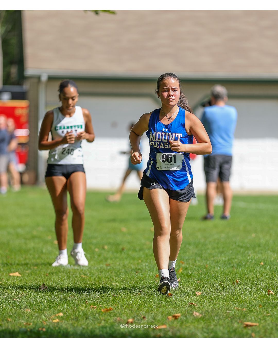 #951 Emily De La Vega, Mount Pleasant High School, 5k Run - Girls (Hindley), P45, 31:09.54 - #951 Emily De La Vega, Mount Pleasant High School, 5k Run - Girls (Hindley), P45, 31:09.54; #240 Aaliyah Leger, Cranston East High School, 5k Run - Girls (Hindley), P47, 32:32.55 - 2026 Injury Fund Carnival XC - Deerfield Park - Greenville, Rhode Island - September 05, 2026 File: ./dir-4-5k_Run-Girls-Hindley/260905-2026-injury-fund-xc-deerfield-park-607-398A1039.jpg #951 Emily De La Vega, Mount Pleasant High School, 5k Run - Girls (Hindley), P45, 31:09.54 - #951 Emily De La Vega, Mount Pleasant High Sch…