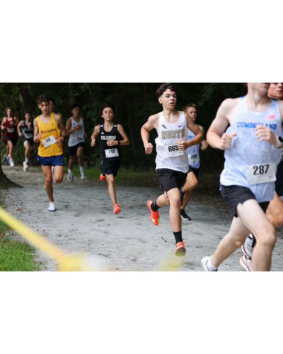 #287 Patrick Bickerstaff, Cumberland, 4k Run - Boys (Dwyer), P25, 16:56.17; #665 Mason Moreira, North Kingstown High School, 4k Run - Boys (Dwyer), P39, 17:46.51; #296 Jackson Thurston, Cumberland, 4k Run - Boys (Dwyer), P17, 16:46.20 - #287 Patrick Bickerstaff, Cumberland, 4k Run - Boys (Dwyer), P25, 16:56.17; #665 Mason Moreira, North Kingstown High School, 4k Run - Boys (Dwyer), P39, 17:46.51; #296 Jackson Thurston, Cumberland, 4k Run - Boys (Dwyer), P17, 16:46.20 - 2026 Injury Fund Carnival XC - Deerfield Park - Greenville, Rhode Island - September 05, 2026 File: ./dir-5-4k_Run-Boys-Dwyer/260905-2026-injury-fund-xc-deerfield-park-659-398A2086.jpg #287 Patrick Bickerstaff, Cumberland, 4k Run - Boys (Dwyer), P25, 16:56.17; #665 Mason Moreira, North Kingstown High School, 4k Run - Boys…