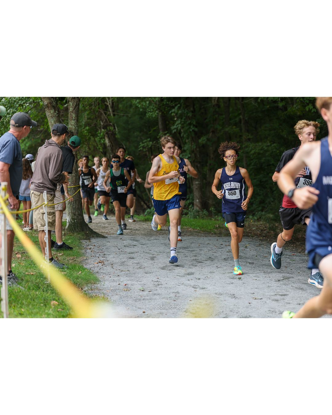 #396 Elijah Gibbs, Exeter-West Greenwich Regional, 4k Run - Boys (Dwyer), P9, 16:14.13; #550 Cairo Carvalho, Moses Brown School, 4k Run - Boys (Dwyer), P28, 17:19.15 - #398 Konstantinos Marantidis, Exeter-West Greenwich Regional, 4k Run - Boys (Dwyer), P127, 26:09.70; #550 Cairo Carvalho, Moses Brown School, 4k Run - Boys (Dwyer), P28, 17:19.15 - 2026 Injury Fund Carnival XC - Deerfield Park - Greenville, Rhode Island - September 05, 2026 File: ./dir-5-4k_Run-Boys-Dwyer/260905-2026-injury-fund-xc-deerfield-park-661-398A2116.jpg #396 Elijah Gibbs, Exeter-West Greenwich Regional, 4k Run - Boys (Dwyer), P9, 16:14.13; #550 Cairo Carvalho, Moses Brown School, 4k Run - B…