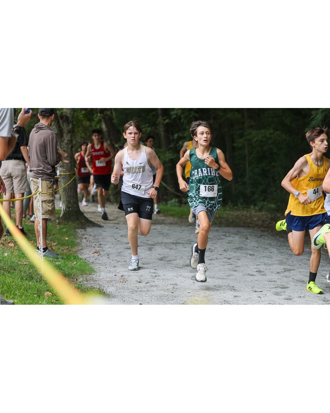 #647 Graham Flippin, North Kingstown High School, 4k Run - Boys (Dwyer), P34, 17:30.65; #166 Lucas Lindsay, Chariho High School, 4k Run - Boys (Dwyer), P40, 17:47.58; #44 Truman Lefort, Barrington High School, 4k Run - Boys (Dwyer), P26, 16:58.00 - 2026 Injury Fund Carnival XC - Deerfield Park - Greenville, Rhode Island - September 05, 2026 File: ./dir-5-4k_Run-Boys-Dwyer/260905-2026-injury-fund-xc-deerfield-park-665-398A2168.jpg #647 Graham Flippin, North Kingstown High School, 4k Run - Boys (Dwyer), P34, 17:30.65; #166 Lucas Lindsay, Chariho High School, 4k Run - B…