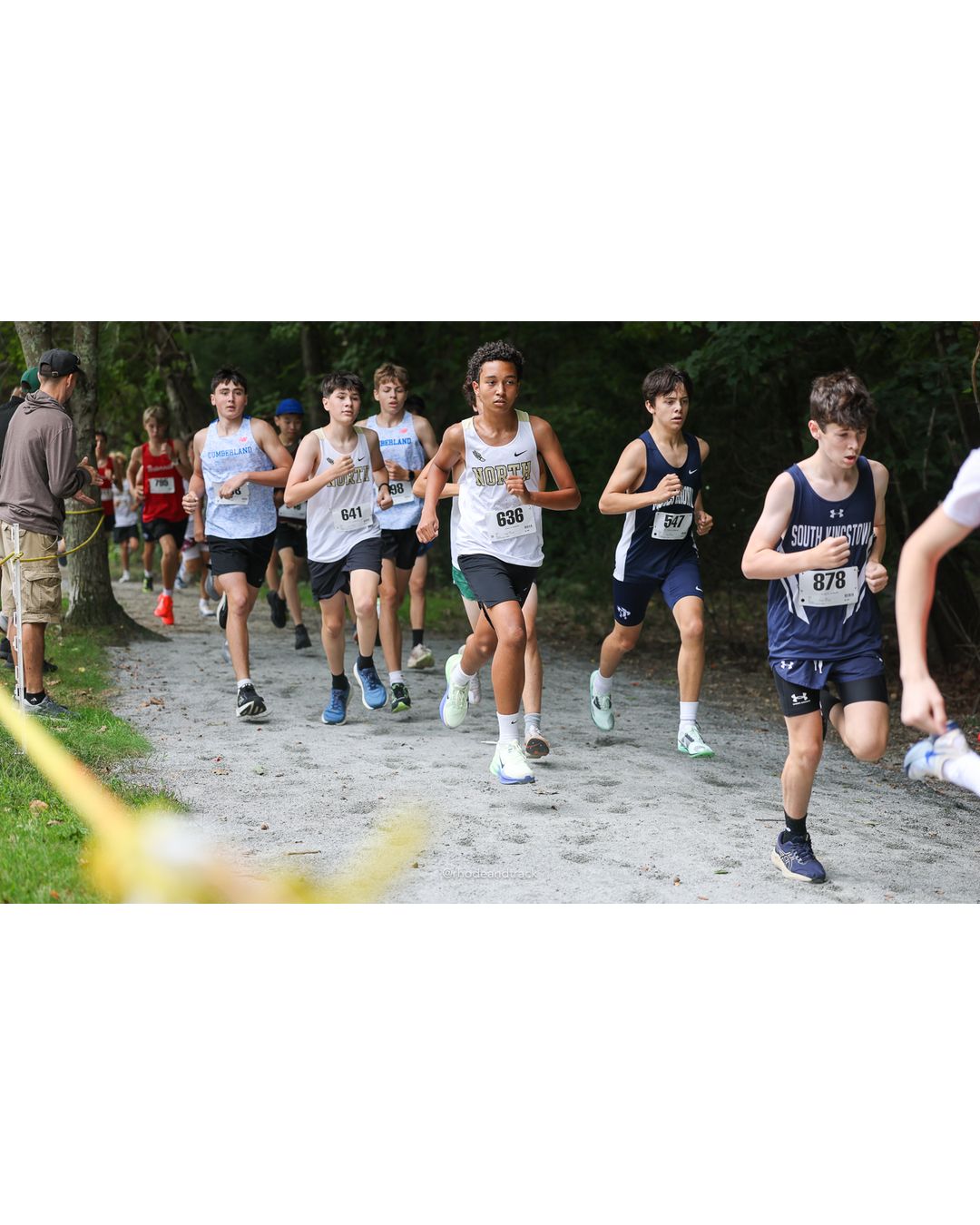 #878 Sebby Garvin, South Kingstown High School, 4k Run - Boys (Dwyer), P81, 19:46.55; #636 Weston Christian, North Kingstown High School, 4k Run - Boys (Dwyer), P44, 18:08.08; #641 Landon Dutcher, North Kingstown High School, 4k Run - Boys (Dwyer), P43, 17:51.61 - #878 Sebby Garvin, South Kingstown High School, 4k Run - Boys (Dwyer), P81, 19:46.55; #636 Weston Christian, North Kingstown High School, 4k Run - Boys (Dwyer), P44, 18:08.08; #641 Landon Dutcher, North Kingstown High School, 4k Run - Boys (Dwyer), P43, 17:51.61 - 2026 Injury Fund Carnival XC - Deerfield Park - Greenville, Rhode Island - September 05, 2026 File: ./dir-5-4k_Run-Boys-Dwyer/260905-2026-injury-fund-xc-deerfield-park-670-398A2234.jpg #878 Sebby Garvin, South Kingstown High School, 4k Run - Boys (Dwyer), P81, 19:46.55; #636 Weston Christian, North Kingstown High School, 4…
