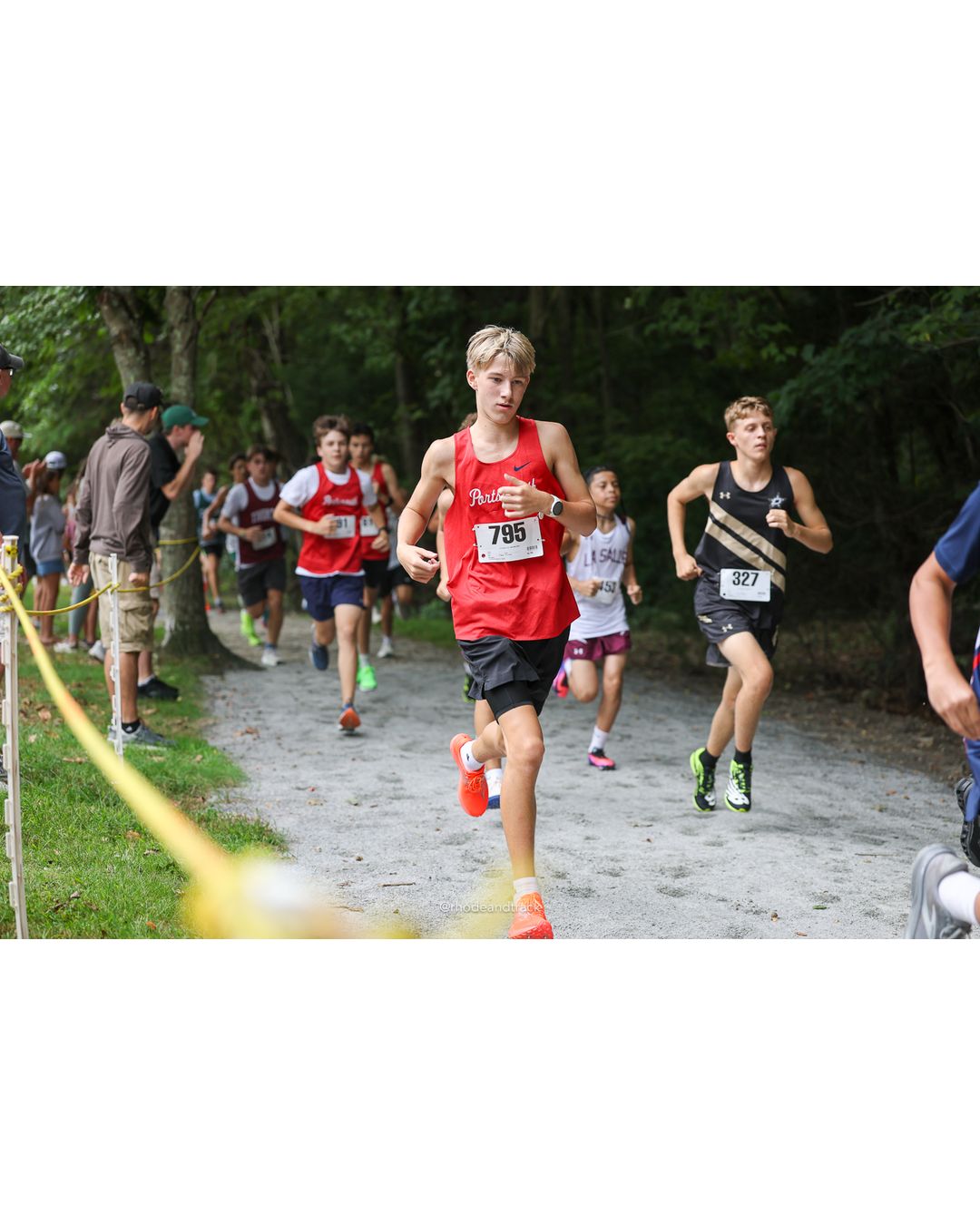 #795 Tristan Harrington, Portsmouth High School, 4k Run - Boys (Dwyer), P21, 16:50.54; #327 Austin Gagnon, Davies High School, 4k Run - Boys (Dwyer), P83, 19:50.39 - #795 Tristan Harrington, Portsmouth High School, 4k Run - Boys (Dwyer), P21, 16:50.54; #327 Austin Gagnon, Davies High School, 4k Run - Boys (Dwyer), P83, 19:50.39 - 2026 Injury Fund Carnival XC - Deerfield Park - Greenville, Rhode Island - September 05, 2026 File: ./dir-5-4k_Run-Boys-Dwyer/260905-2026-injury-fund-xc-deerfield-park-672-398A2265.jpg #795 Tristan Harrington, Portsmouth High School, 4k Run - Boys (Dwyer), P21, 16:50.54; #327 Austin Gagnon, Davies High School, 4k Run - Boy…