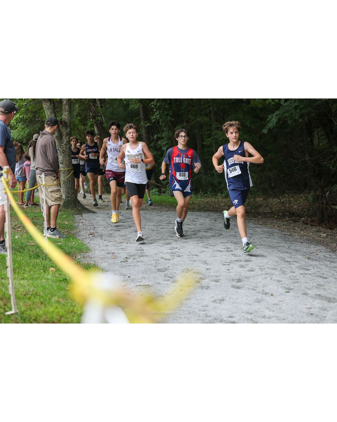 #669 Tyler Parkhurst, North Kingstown High School, 4k Run - Boys (Dwyer), P75, 19:14.44; #933 Maria Youakim, La Salle Academy, 4k Run - Boys (Dwyer), P77, 19:28.13 - #546 Lucien Beauregard, Moses Brown School, 4k Run - Boys (Dwyer), P89, 20:11.05; #933 Maria Youakim, La Salle Academy, 4k Run - Boys (Dwyer), P77, 19:28.13 - 2026 Injury Fund Carnival XC - Deerfield Park - Greenville, Rhode Island - September 05, 2026 File: ./dir-5-4k_Run-Boys-Dwyer/260905-2026-injury-fund-xc-deerfield-park-677-398A2335.jpg #669 Tyler Parkhurst, North Kingstown High School, 4k Run - Boys (Dwyer), P75, 19:14.44; #933 Maria Youakim, La Salle Academy, 4k Run - Boy…