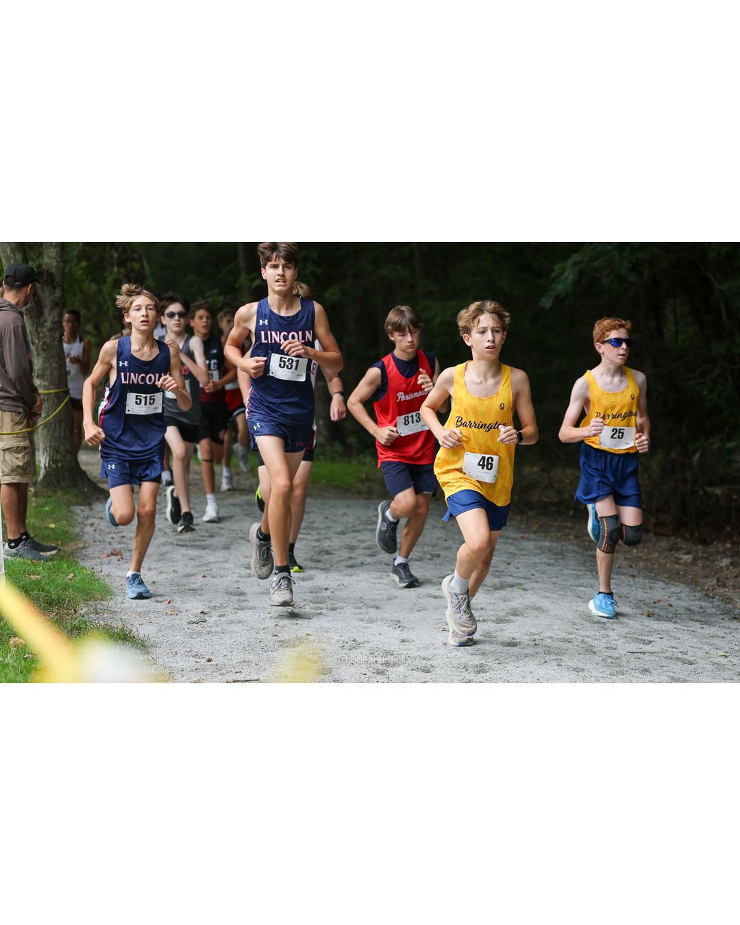 #531 Jackson Worcester, Lincoln High School, 4k Run - Boys (Dwyer), P84, 19:52.72; #873 Oliver Clancy, South Kingstown High School; #46 Sam Lesser, Barrington High School, 4k Run - Boys (Dwyer), P80, 19:44.19 - #46 Sam Lesser, Barrington High School, 4k Run - Boys (Dwyer), P80, 19:44.19 - 2026 Injury Fund Carnival XC - Deerfield Park - Greenville, Rhode Island - September 05, 2026 File: ./dir-5-4k_Run-Boys-Dwyer/260905-2026-injury-fund-xc-deerfield-park-679-398A2359.jpg #531 Jackson Worcester, Lincoln High School, 4k Run - Boys (Dwyer), P84, 19:52.72; #873 Oliver Clancy, South Kingstown High School; #46 Sam…
