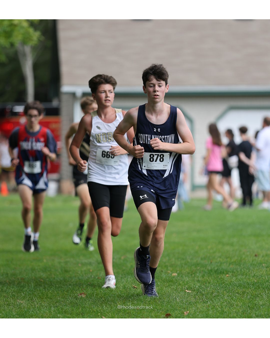 #663 Finn McPartlin, North Kingstown High School - #878 Sebby Garvin, South Kingstown High School, 4k Run - Boys (Dwyer), P81, 19:46.55; #663 Finn McPartlin, North Kingstown High School - 2026 Injury Fund Carnival XC - Deerfield Park - Greenville, Rhode Island - September 05, 2026 File: ./dir-5-4k_Run-Boys-Dwyer/260905-2026-injury-fund-xc-deerfield-park-759-398A3180.jpg #663 Finn McPartlin, North Kingstown High School - #878 Sebby Garvin, South Kingstown High School, 4k Run - Boys (Dwyer), P81, 19:46.55; #6…