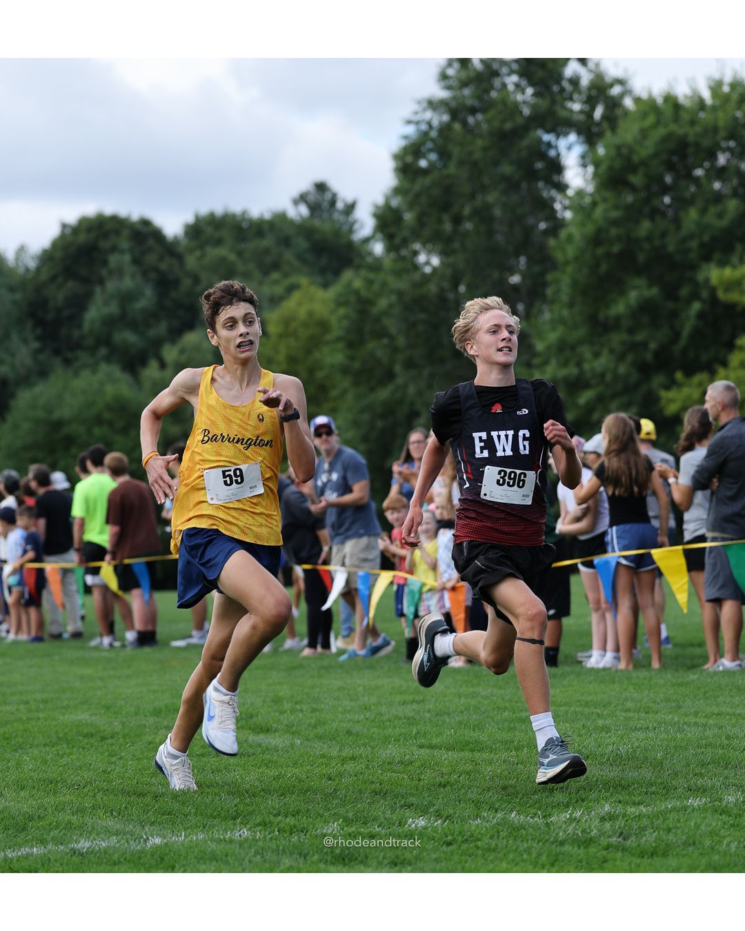 #396 Elijah Gibbs, Exeter-West Greenwich Regional, 4k Run - Boys (Dwyer), P9, 16:14.13; #59 Elija Rome, Barrington High School, 4k Run - Boys (Dwyer), P10, 16:14.38 - #396 Elijah Gibbs, Exeter-West Greenwich Regional, 4k Run - Boys (Dwyer), P9, 16:14.13; #59 Elija Rome, Barrington High School, 4k Run - Boys (Dwyer), P10, 16:14.38 - 2026 Injury Fund Carnival XC - Deerfield Park - Greenville, Rhode Island - September 05, 2026 File: ./dir-5-4k_Run-Boys-Dwyer/260905-2026-injury-fund-xc-deerfield-park-805-398A3854.jpg #396 Elijah Gibbs, Exeter-West Greenwich Regional, 4k Run - Boys (Dwyer), P9, 16:14.13; #59 Elija Rome, Barrington High School, 4k Run - Bo…