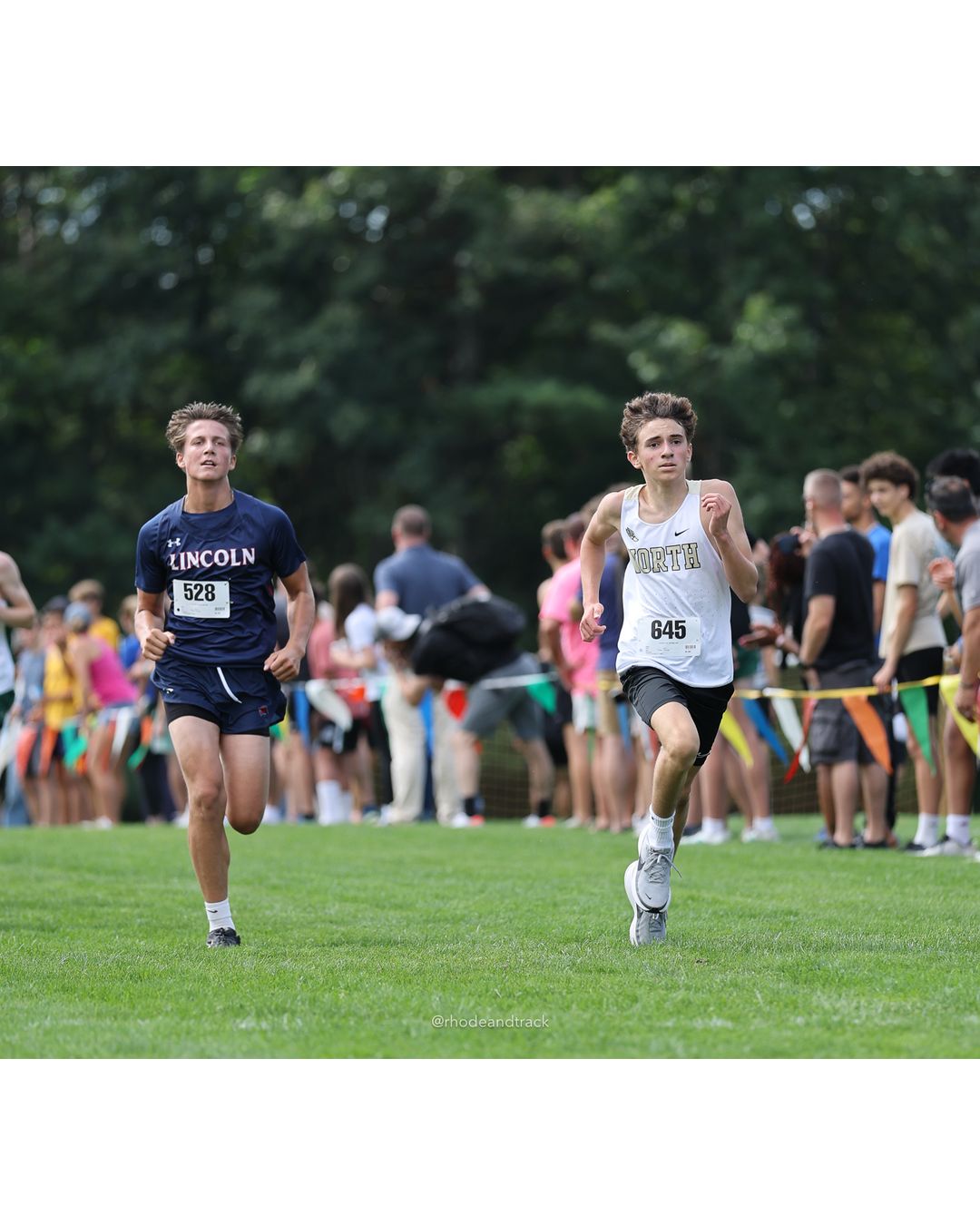 #645 Zachary Ferreira, North Kingstown High School, 4k Run - Boys (Dwyer), P51, 18:21.47; #528 Jackson Therien, Lincoln High School, 4k Run - Boys (Dwyer), P52, 18:22.01 - #528 Jackson Therien, Lincoln High School, 4k Run - Boys (Dwyer), P52, 18:22.01 - 2026 Injury Fund Carnival XC - Deerfield Park - Greenville, Rhode Island - September 05, 2026 File: ./dir-5-4k_Run-Boys-Dwyer/260905-2026-injury-fund-xc-deerfield-park-844-398A4363.jpg #645 Zachary Ferreira, North Kingstown High School, 4k Run - Boys (Dwyer), P51, 18:21.47; #528 Jackson Therien, Lincoln High School, 4k Run…