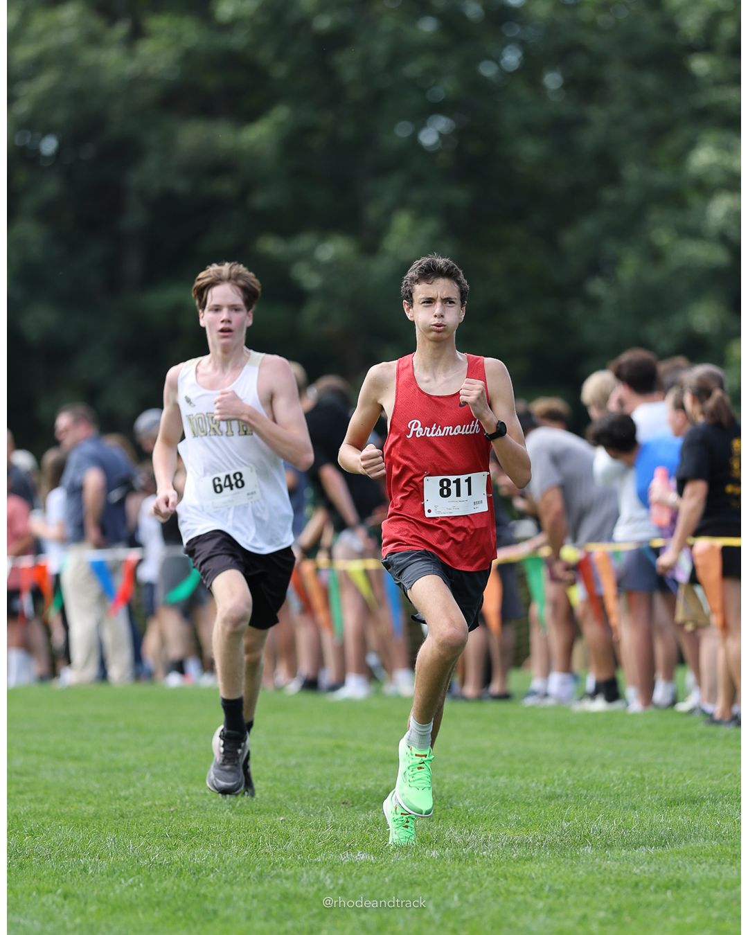 #648 Jaxson Gatlin, North Kingstown High School, 4k Run - Boys (Dwyer), P58, 18:30.89; #811 Luke Toro, Portsmouth High School, 4k Run - Boys (Dwyer), P57, 18:30.22 - #648 Jaxson Gatlin, North Kingstown High School, 4k Run - Boys (Dwyer), P58, 18:30.89; #811 Luke Toro, Portsmouth High School, 4k Run - Boys (Dwyer), P57, 18:30.22 - 2026 Injury Fund Carnival XC - Deerfield Park - Greenville, Rhode Island - September 05, 2026 File: ./dir-5-4k_Run-Boys-Dwyer/260905-2026-injury-fund-xc-deerfield-park-851-398A4449.jpg #648 Jaxson Gatlin, North Kingstown High School, 4k Run - Boys (Dwyer), P58, 18:30.89; #811 Luke Toro, Portsmouth High School, 4k Run - Boy…