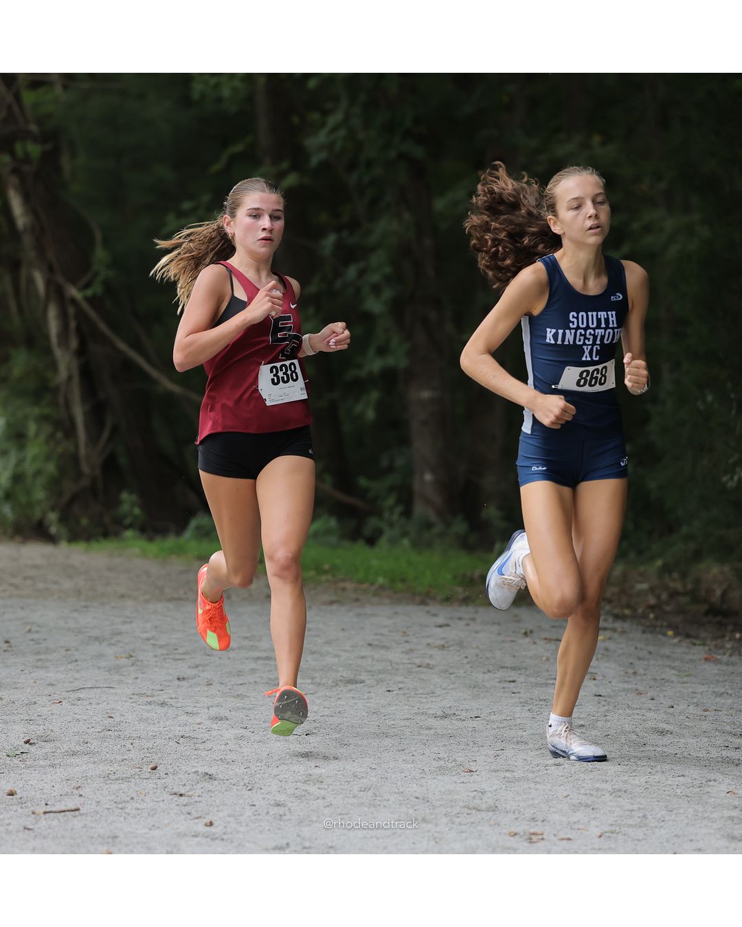 #338 Julia Fuimarello, East Greenwich High School, 4k Run - Girls (Leddy), P3, 15:50.74 - #868 Emma Morrisey, South Kingstown High School, 4k Run - Girls (Leddy), P1, 14:58.63 - 2026 Injury Fund Carnival XC - Deerfield Park - Greenville, Rhode Island - September 05, 2026 File: ./dir-6-4k_Run-Girls-Leddy/260905-2026-injury-fund-xc-deerfield-park-932-398A5539.jpg #338 Julia Fuimarello, East Greenwich High School, 4k Run - Girls (Leddy), P3, 15:50.74 - #868 Emma Morrisey, South Kingstown High School,…