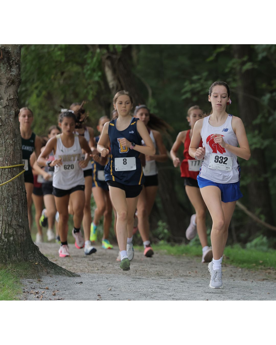 #932 Mariam Gomez, La Salle Academy, 4k Run - Girls (Leddy), P27, 19:56.60; #620 Josephine Panoutsakopoulos, North Kingstown High School, 4k Run - Girls (Leddy), P40, 21:00.87; #8 Genevieve Frander, Barrington High School, 4k Run - Girls (Leddy), P10, 17:42.38 - #8 Genevieve Frander, Barrington High School, 4k Run - Girls (Leddy), P10, 17:42.38 - 2026 Injury Fund Carnival XC - Deerfield Park - Greenville, Rhode Island - September 05, 2026 File: ./dir-6-4k_Run-Girls-Leddy/260905-2026-injury-fund-xc-deerfield-park-939-398A5633.jpg #932 Mariam Gomez, La Salle Academy, 4k Run - Girls (Leddy), P27, 19:56.60; #620 Josephine Panoutsakopoulos, North Kingstown High School, 4…