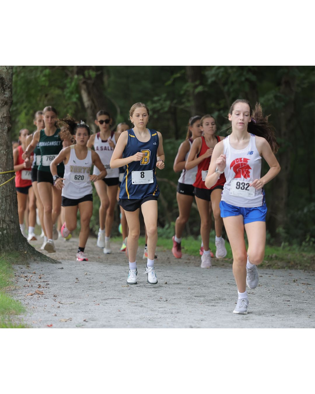 #932 Mariam Gomez, La Salle Academy, 4k Run - Girls (Leddy), P27, 19:56.60; #620 Josephine Panoutsakopoulos, North Kingstown High School, 4k Run - Girls (Leddy), P40, 21:00.87; #760 Magnolia Sullivan, Ponaganset High School, 4k Run - Girls (Leddy), P38, 20:45.06 - #932 Mariam Gomez, La Salle Academy, 4k Run - Girls (Leddy), P27, 19:56.60; #620 Josephine Panoutsakopoulos, North Kingstown High School, 4k Run - Girls (Leddy), P40, 21:00.87; #760 Magnolia Sullivan, Ponaganset High School, 4k Run - Girls (Leddy), P38, 20:45.06 - 2026 Injury Fund Carnival XC - Deerfield Park - Greenville, Rhode Island - September 05, 2026 File: ./dir-6-4k_Run-Girls-Leddy/260905-2026-injury-fund-xc-deerfield-park-940-398A5645_1.jpg #932 Mariam Gomez, La Salle Academy, 4k Run - Girls (Leddy), P27, 19:56.60; #620 Josephine Panoutsakopoulos, North Kingstown High School, 4…