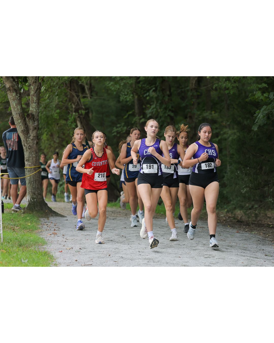 #210 Bella Medeiros, Coventry High School, 4k Run - Girls (Leddy), P31, 20:12.83 - #210 Bella Medeiros, Coventry High School, 4k Run - Girls (Leddy), P31, 20:12.83; #182 Guilanne Bernal, Classical High School, 4k Run - Girls (Leddy), P67, 26:26.28 - 2026 Injury Fund Carnival XC - Deerfield Park - Greenville, Rhode Island - September 05, 2026 File: ./dir-6-4k_Run-Girls-Leddy/260905-2026-injury-fund-xc-deerfield-park-948-398A5768.jpg #210 Bella Medeiros, Coventry High School, 4k Run - Girls (Leddy), P31, 20:12.83 - #210 Bella Medeiros, Coventry High School, 4k Run - Girl…