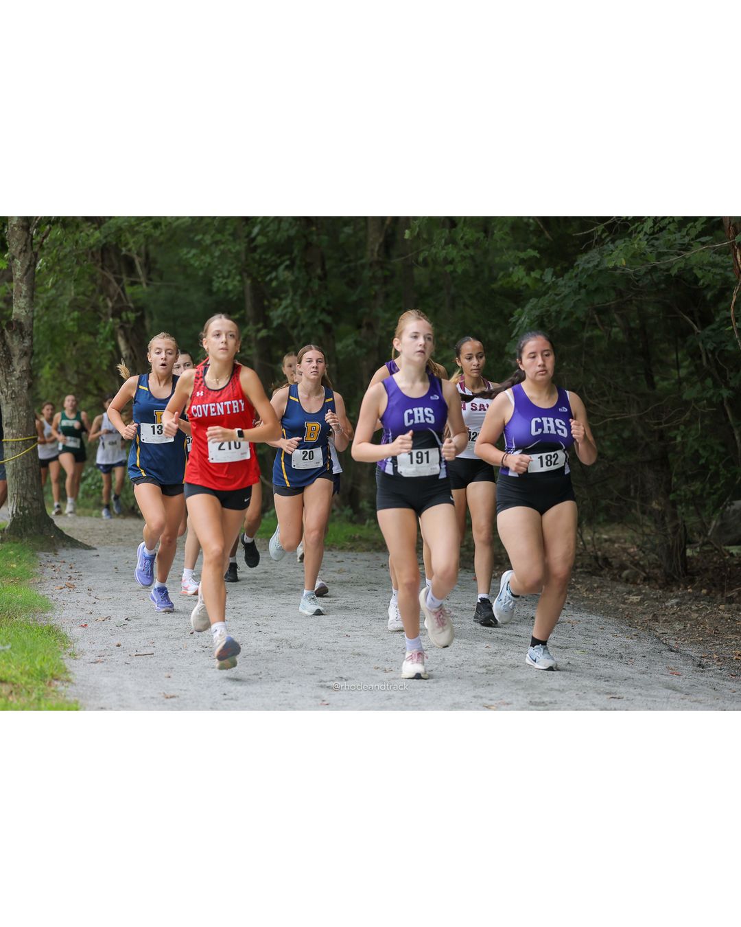 #191 Eleanor Pinsker, Classical High School, 4k Run - Girls (Leddy), P64, 25:33.69; #182 Guilanne Bernal, Classical High School, 4k Run - Girls (Leddy), P67, 26:26.28 - #191 Eleanor Pinsker, Classical High School, 4k Run - Girls (Leddy), P64, 25:33.69; #20 Jenna Rotondo, Barrington High School, 4k Run - Girls (Leddy), P52, 22:30.86 - 2026 Injury Fund Carnival XC - Deerfield Park - Greenville, Rhode Island - September 05, 2026 File: ./dir-6-4k_Run-Girls-Leddy/260905-2026-injury-fund-xc-deerfield-park-949-398A5779.jpg #191 Eleanor Pinsker, Classical High School, 4k Run - Girls (Leddy), P64, 25:33.69; #182 Guilanne Bernal, Classical High School, 4k Run - G…
