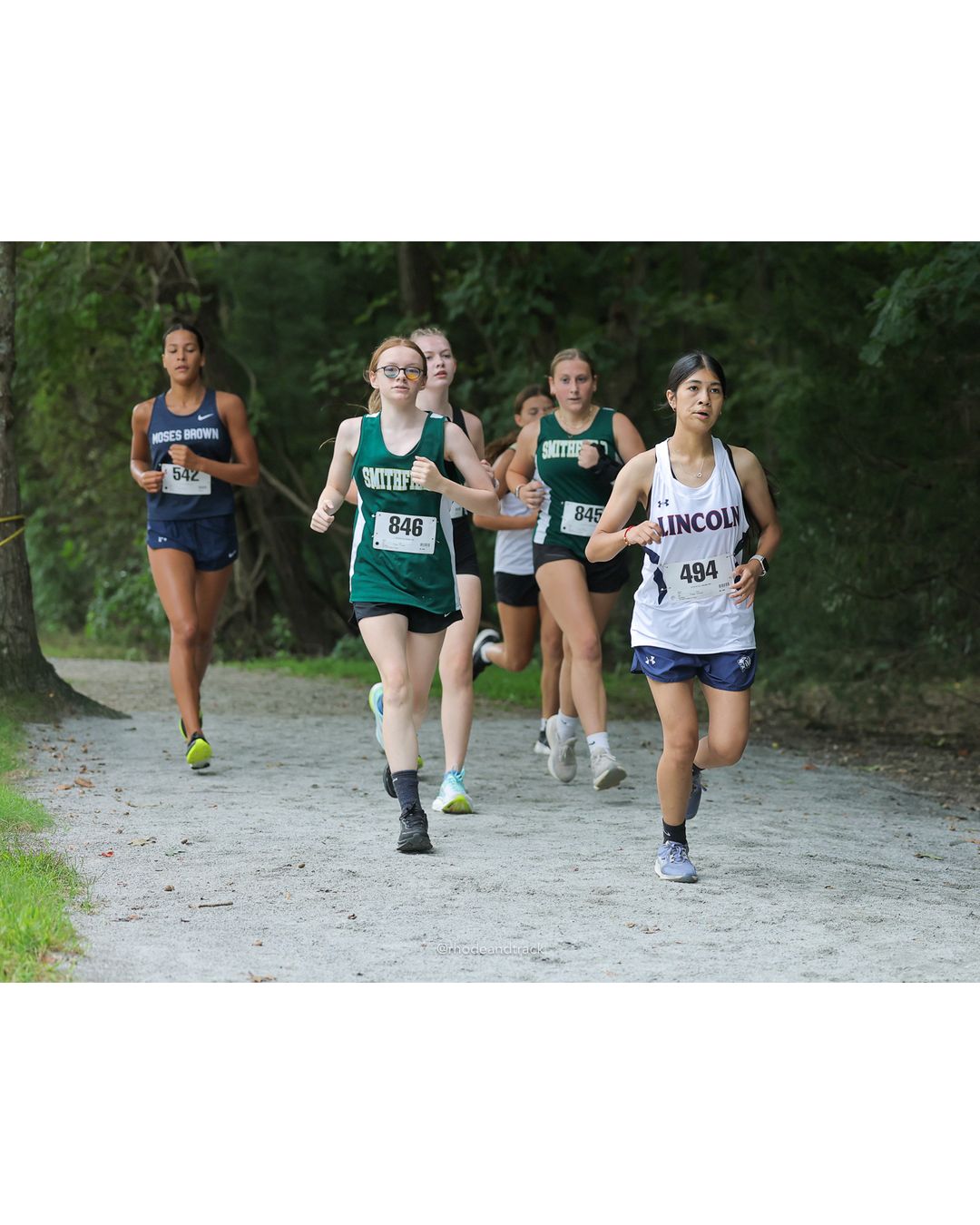 #494 Isabelle Garza, Lincoln High School, 4k Run - Girls (Leddy), P68, 26:33.69; #846 Katelyn Sanford, Smithfield High School, 4k Run - Girls (Leddy), P57, 23:56.46 - #494 Isabelle Garza, Lincoln High School, 4k Run - Girls (Leddy), P68, 26:33.69; #846 Katelyn Sanford, Smithfield High School, 4k Run - Girls (Leddy), P57, 23:56.46; #845 Brianna Mirabile, Smithfield High School, 4k Run - Girls (Leddy), P62, 25:04.70 - 2026 Injury Fund Carnival XC - Deerfield Park - Greenville, Rhode Island - September 05, 2026 File: ./dir-6-4k_Run-Girls-Leddy/260905-2026-injury-fund-xc-deerfield-park-953-398A5807.jpg #494 Isabelle Garza, Lincoln High School, 4k Run - Girls (Leddy), P68, 26:33.69; #846 Katelyn Sanford, Smithfield High School, 4k Run - Gir…