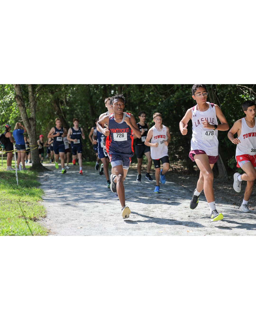 #478 Oliver Simoes, La Salle Academy, 5k Run - Boys (Myers), P82, 22:21.62; #726 Devin Depass, Pawtucket Co-op, 5k Run - Boys (Myers), P94, 24:00.28 - #478 Oliver Simoes, La Salle Academy, 5k Run - Boys (Myers), P82, 22:21.62; #726 Devin Depass, Pawtucket Co-op, 5k Run - Boys (Myers), P94, 24:00.28; #36 Danny Gildea, Barrington High School - 2026 Injury Fund Carnival XC - Deerfield Park - Greenville, Rhode Island - September 05, 2026 File: ./dir-7-5k_Run-Boys-Myers/260905-2026-injury-fund-xc-deerfield-park-1089-398A7583_1.jpg #478 Oliver Simoes, La Salle Academy, 5k Run - Boys (Myers), P82, 22:21.62; #726 Devin Depass, Pawtucket Co-op, 5k Run - Boys (Myers), P94,…