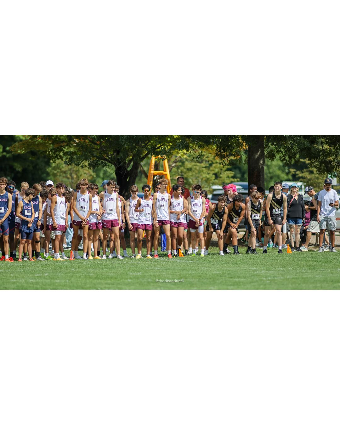 #465 Matthew Lewis, La Salle Academy, 5k Run - Boys (Myers), P1, 16:10.45; #488 Eric Wilding, La Salle Academy, 5k Run - Boys (Myers), P27, 19:05.73; #464 Jackson Lewis, La Salle Academy, 5k Run - Boys (Myers), P6, 17:31.89 - 2026 Injury Fund Carnival XC - Deerfield Park - Greenville, Rhode Island - September 05, 2026 File: ./dir-7-5k_Run-Boys-Myers/260905-2026-injury-fund-xc-deerfield-park-1103-8P0A0858.jpg #465 Matthew Lewis, La Salle Academy, 5k Run - Boys (Myers), P1, 16:10.45; #488 Eric Wilding, La Salle Academy, 5k Run - Boys (Myers), P27,…