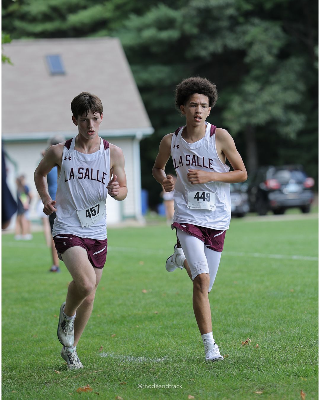 #457 Jimmy Donovan, La Salle Academy, 5k Run - Boys (Myers), P25, 18:55.57; #449 Carlos Baez-Inoa, La Salle Academy, 5k Run - Boys (Myers), P29, 19:23.49 - #457 Jimmy Donovan, La Salle Academy, 5k Run - Boys (Myers), P25, 18:55.57 - 2026 Injury Fund Carnival XC - Deerfield Park - Greenville, Rhode Island - September 05, 2026 File: ./dir-7-5k_Run-Boys-Myers/260905-2026-injury-fund-xc-deerfield-park-1130-398A8048_1.jpg #457 Jimmy Donovan, La Salle Academy, 5k Run - Boys (Myers), P25, 18:55.57; #449 Carlos Baez-Inoa, La Salle Academy, 5k Run - Boys (Myers),…