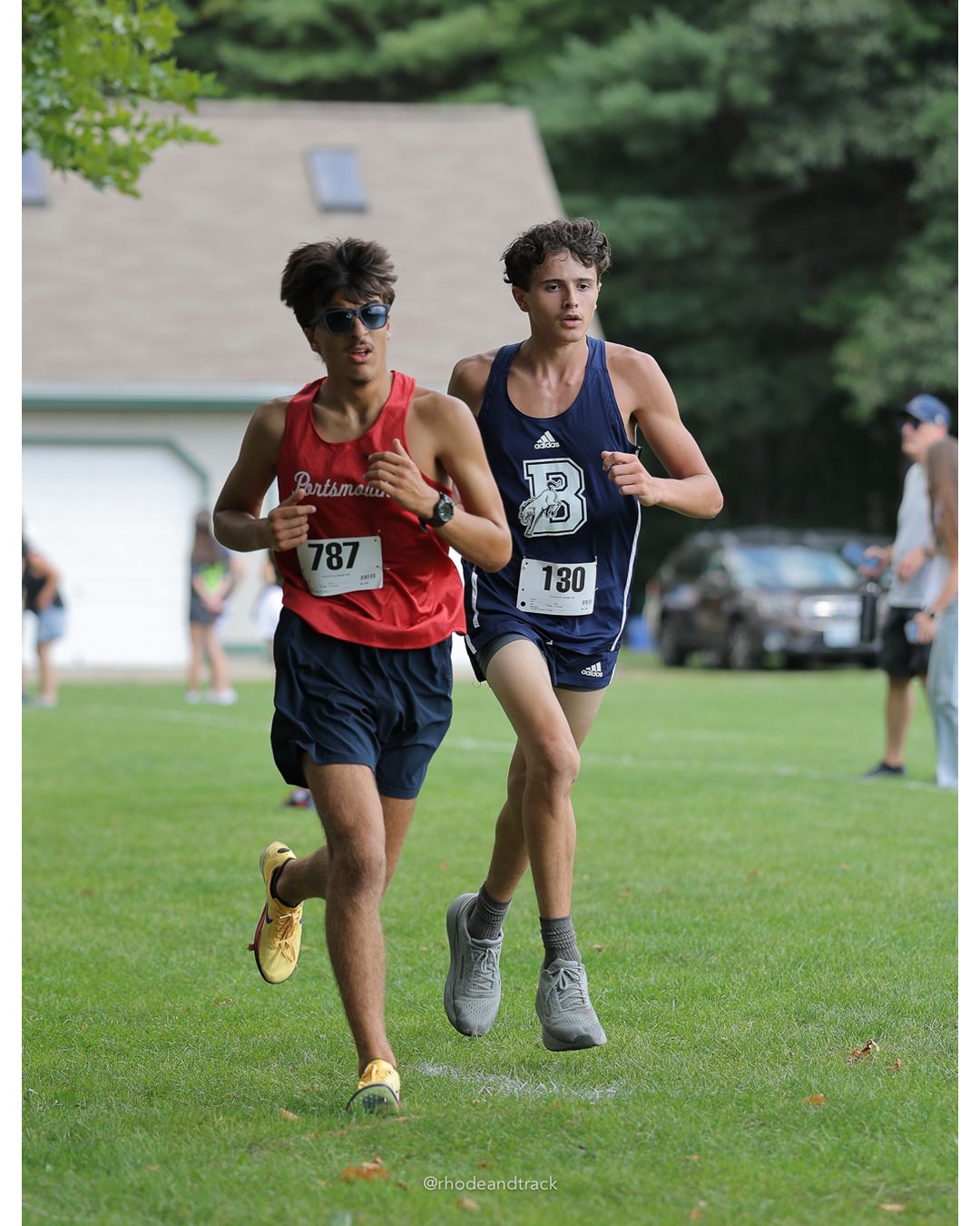 #787 Zubin Anand, Portsmouth High School, 5k Run - Boys (Myers), P40, 20:05.74; #130 Ethan LeMay, Burrillville High School, 5k Run - Boys (Myers), P53, 20:48.30 - #787 Zubin Anand, Portsmouth High School, 5k Run - Boys (Myers), P40, 20:05.74; #130 Ethan LeMay, Burrillville High School, 5k Run - Boys (Myers), P53, 20:48.30 - 2026 Injury Fund Carnival XC - Deerfield Park - Greenville, Rhode Island - September 05, 2026 File: ./dir-7-5k_Run-Boys-Myers/260905-2026-injury-fund-xc-deerfield-park-1144-398A8249.jpg #787 Zubin Anand, Portsmouth High School, 5k Run - Boys (Myers), P40, 20:05.74; #130 Ethan LeMay, Burrillville High School, 5k Run - Boys (…