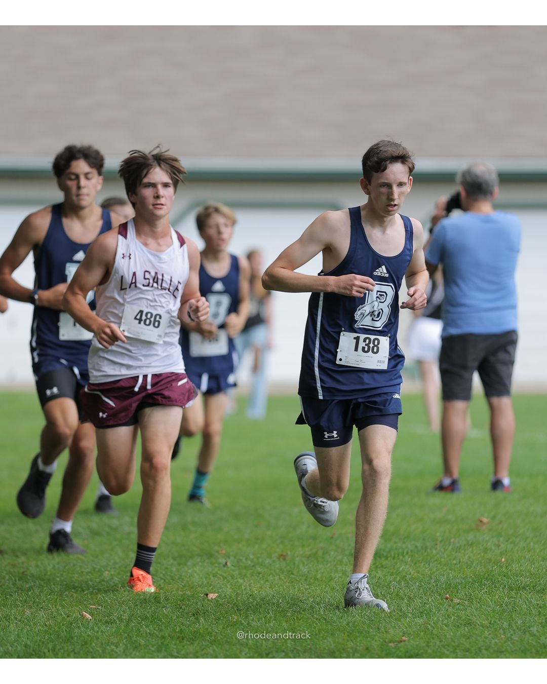 #486 Hawkins Truskoski-McKenna, La Salle Academy, 5k Run - Boys (Myers), P41, 20:06.25; #138 Tanner Russell, Burrillville High School, 5k Run - Boys (Myers), P64, 21:24.46 - 2026 Injury Fund Carnival XC - Deerfield Park - Greenville, Rhode Island - September 05, 2026 File: ./dir-7-5k_Run-Boys-Myers/260905-2026-injury-fund-xc-deerfield-park-1147-398A8344.jpg #486 Hawkins Truskoski-McKenna, La Salle Academy, 5k Run - Boys (Myers), P41, 20:06.25; #138 Tanner Russell, Burrillville High School, 5k R…
