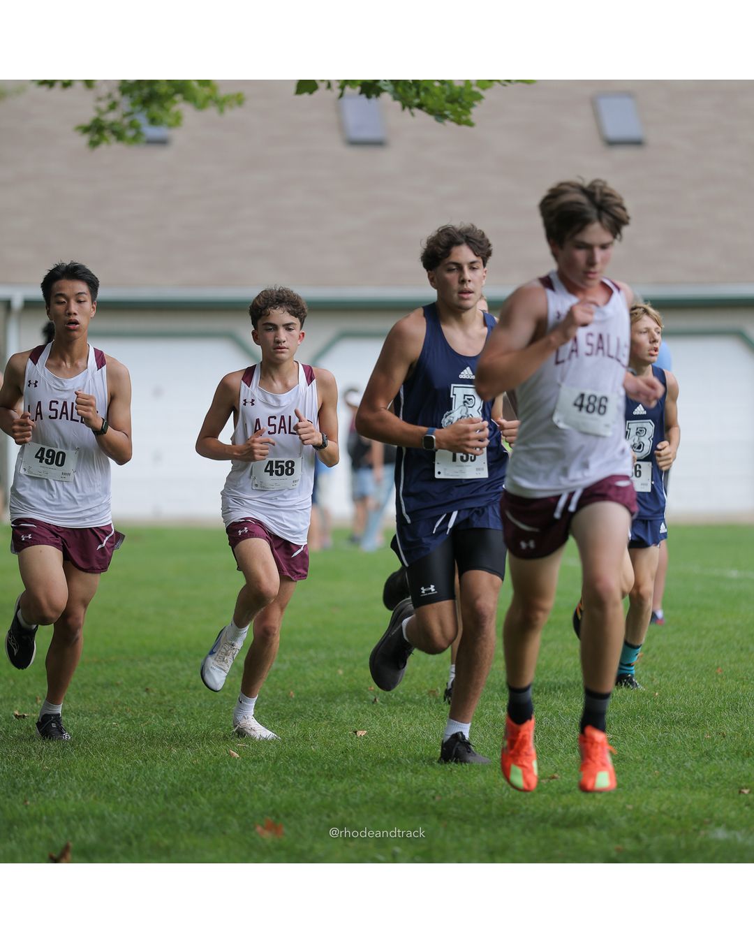 #486 Hawkins Truskoski-McKenna, La Salle Academy, 5k Run - Boys (Myers), P41, 20:06.25; #490 Adee Yung, La Salle Academy, 5k Run - Boys (Myers), P48, 20:17.19; #458 Tyler Fecteau, La Salle Academy, 5k Run - Boys (Myers), P58, 20:59.64 - #486 Hawkins Truskoski-McKenna, La Salle Academy, 5k Run - Boys (Myers), P41, 20:06.25; #490 Adee Yung, La Salle Academy, 5k Run - Boys (Myers), P48, 20:17.19; #458 Tyler Fecteau, La Salle Academy, 5k Run - Boys (Myers), P58, 20:59.64 - 2026 Injury Fund Carnival XC - Deerfield Park - Greenville, Rhode Island - September 05, 2026 File: ./dir-7-5k_Run-Boys-Myers/260905-2026-injury-fund-xc-deerfield-park-1148-398A8360.jpg #486 Hawkins Truskoski-McKenna, La Salle Academy, 5k Run - Boys (Myers), P41, 20:06.25; #490 Adee Yung, La Salle Academy, 5k Run - Boys (My…