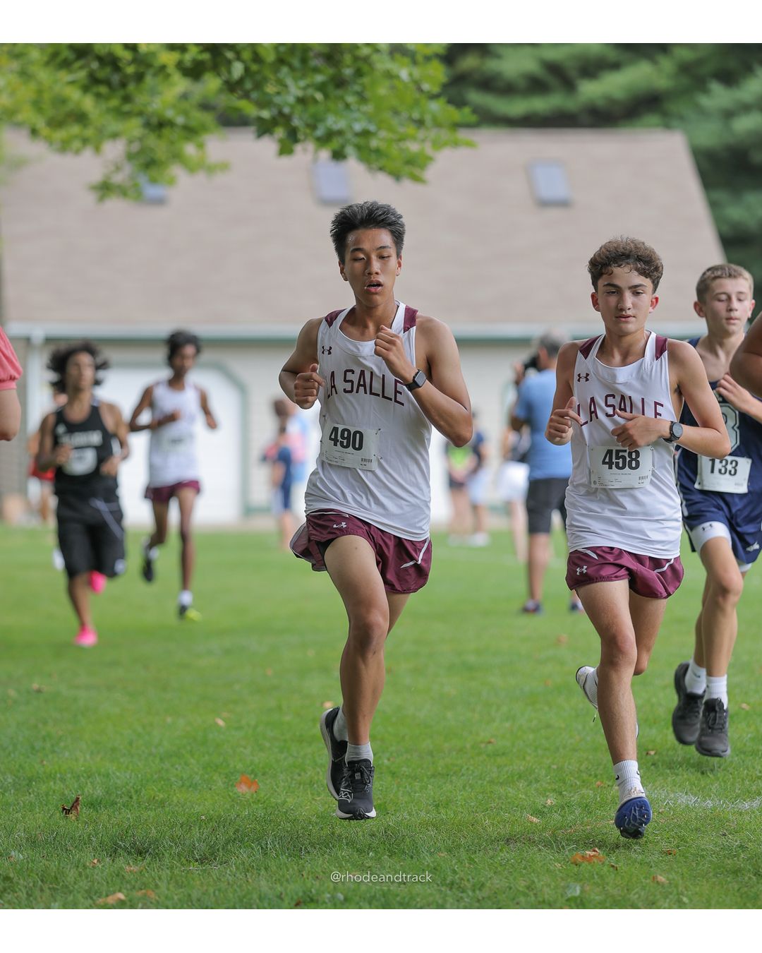 #490 Adee Yung, La Salle Academy, 5k Run - Boys (Myers), P48, 20:17.19; #458 Tyler Fecteau, La Salle Academy, 5k Run - Boys (Myers), P58, 20:59.64; #133 Camden Muldoon, Burrillville High School, 5k Run - Boys (Myers), P65, 21:26.10 - #490 Adee Yung, La Salle Academy, 5k Run - Boys (Myers), P48, 20:17.19; #458 Tyler Fecteau, La Salle Academy, 5k Run - Boys (Myers), P58, 20:59.64 - 2026 Injury Fund Carnival XC - Deerfield Park - Greenville, Rhode Island - September 05, 2026 File: ./dir-7-5k_Run-Boys-Myers/260905-2026-injury-fund-xc-deerfield-park-1150-398A8374.jpg #490 Adee Yung, La Salle Academy, 5k Run - Boys (Myers), P48, 20:17.19; #458 Tyler Fecteau, La Salle Academy, 5k Run - Boys (Myers), P58, 2…