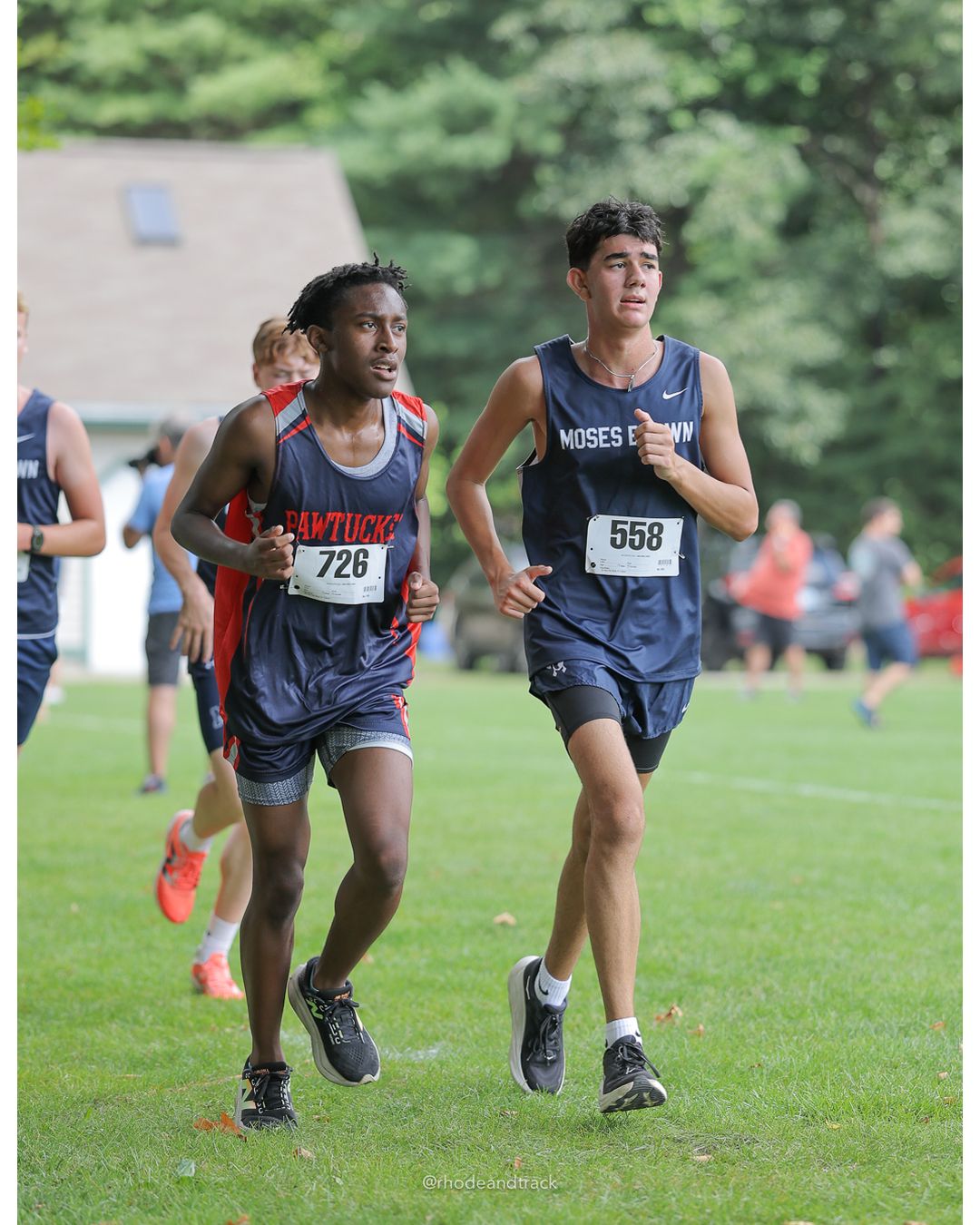 #558 Leiton Kraut, Moses Brown School, 5k Run - Boys (Myers), P70, 21:45.01; #726 Devin Depass, Pawtucket Co-op, 5k Run - Boys (Myers), P94, 24:00.28 - #558 Leiton Kraut, Moses Brown School, 5k Run - Boys (Myers), P70, 21:45.01; #726 Devin Depass, Pawtucket Co-op, 5k Run - Boys (Myers), P94, 24:00.28 - 2026 Injury Fund Carnival XC - Deerfield Park - Greenville, Rhode Island - September 05, 2026 File: ./dir-7-5k_Run-Boys-Myers/260905-2026-injury-fund-xc-deerfield-park-1167-398A8586.jpg #558 Leiton Kraut, Moses Brown School, 5k Run - Boys (Myers), P70, 21:45.01; #726 Devin Depass, Pawtucket Co-op, 5k Run - Boys (Myers), P94…