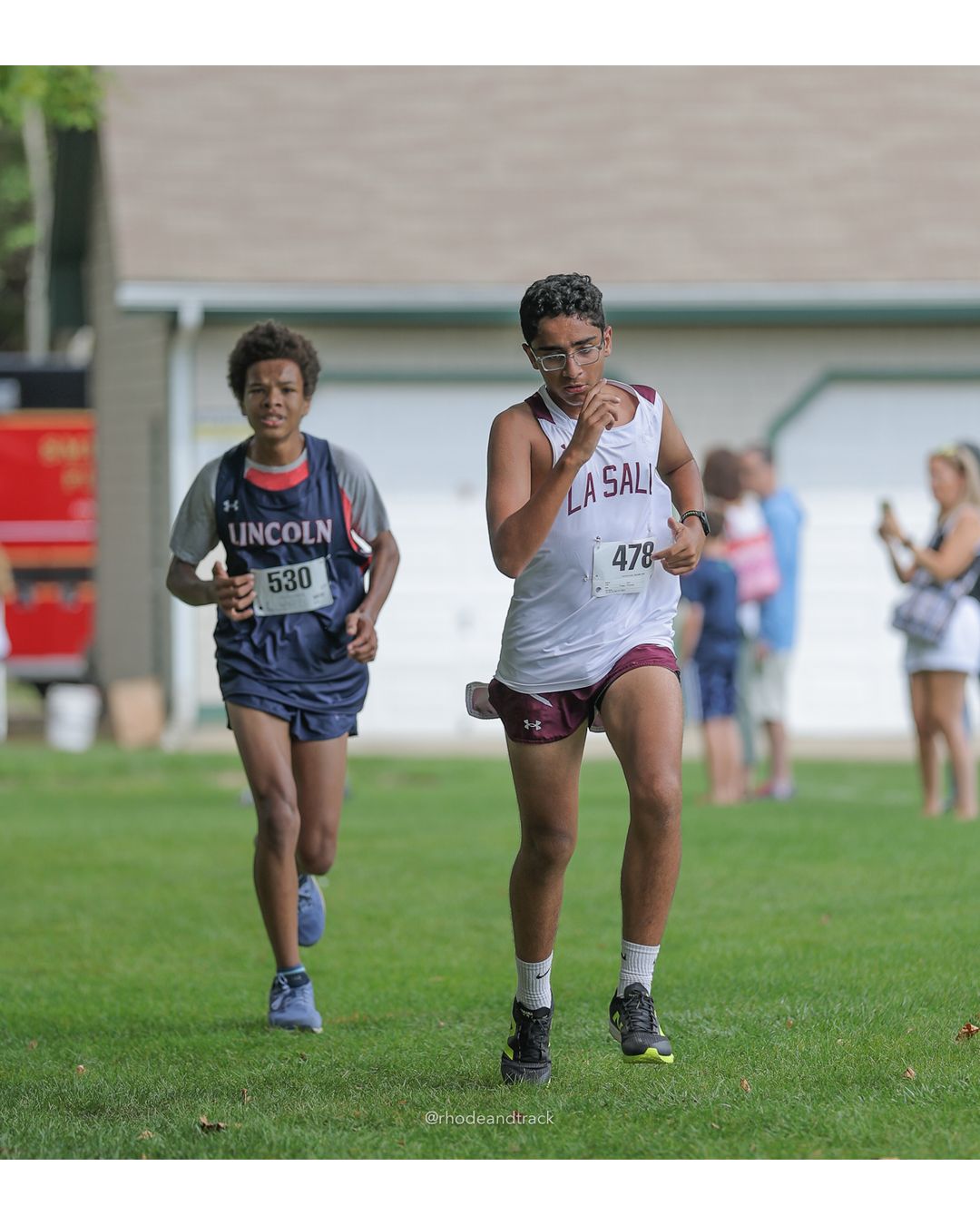 #530 Jideobi Washam-Unaka, Lincoln High School, 5k Run - Boys (Myers), P95, 24:02.83; #478 Oliver Simoes, La Salle Academy, 5k Run - Boys (Myers), P82, 22:21.62 - #478 Oliver Simoes, La Salle Academy, 5k Run - Boys (Myers), P82, 22:21.62; #530 Jideobi Washam-Unaka, Lincoln High School, 5k Run - Boys (Myers), P95, 24:02.83 - 2026 Injury Fund Carnival XC - Deerfield Park - Greenville, Rhode Island - September 05, 2026 File: ./dir-7-5k_Run-Boys-Myers/260905-2026-injury-fund-xc-deerfield-park-1169-398A8609.jpg #530 Jideobi Washam-Unaka, Lincoln High School, 5k Run - Boys (Myers), P95, 24:02.83; #478 Oliver Simoes, La Salle Academy, 5k Run - Boys (…