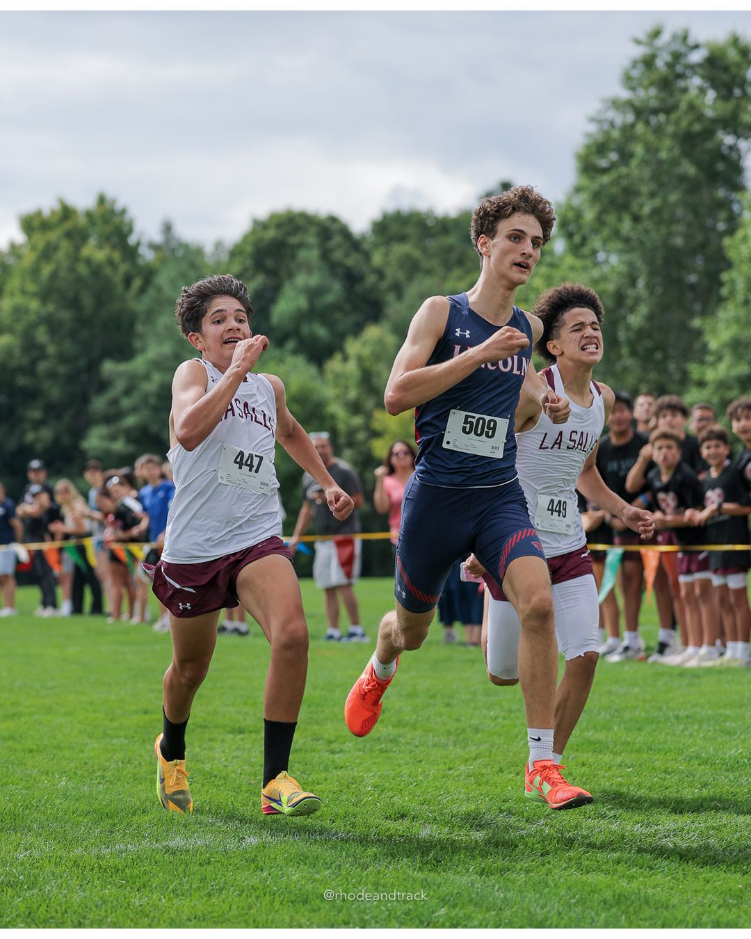#509 Lucas Burdette, Lincoln High School, 5k Run - Boys (Myers), P30, 19:23.72; #447 Daniel Anter, La Salle Academy, 5k Run - Boys (Myers), P31, 19:24.33 - #509 Lucas Burdette, Lincoln High School, 5k Run - Boys (Myers), P30, 19:23.72; #447 Daniel Anter, La Salle Academy, 5k Run - Boys (Myers), P31, 19:24.33 - 2026 Injury Fund Carnival XC - Deerfield Park - Greenville, Rhode Island - September 05, 2026 File: ./dir-7-5k_Run-Boys-Myers/260905-2026-injury-fund-xc-deerfield-park-1202-398A9597.jpg #509 Lucas Burdette, Lincoln High School, 5k Run - Boys (Myers), P30, 19:23.72; #447 Daniel Anter, La Salle Academy, 5k Run - Boys (Myers),…