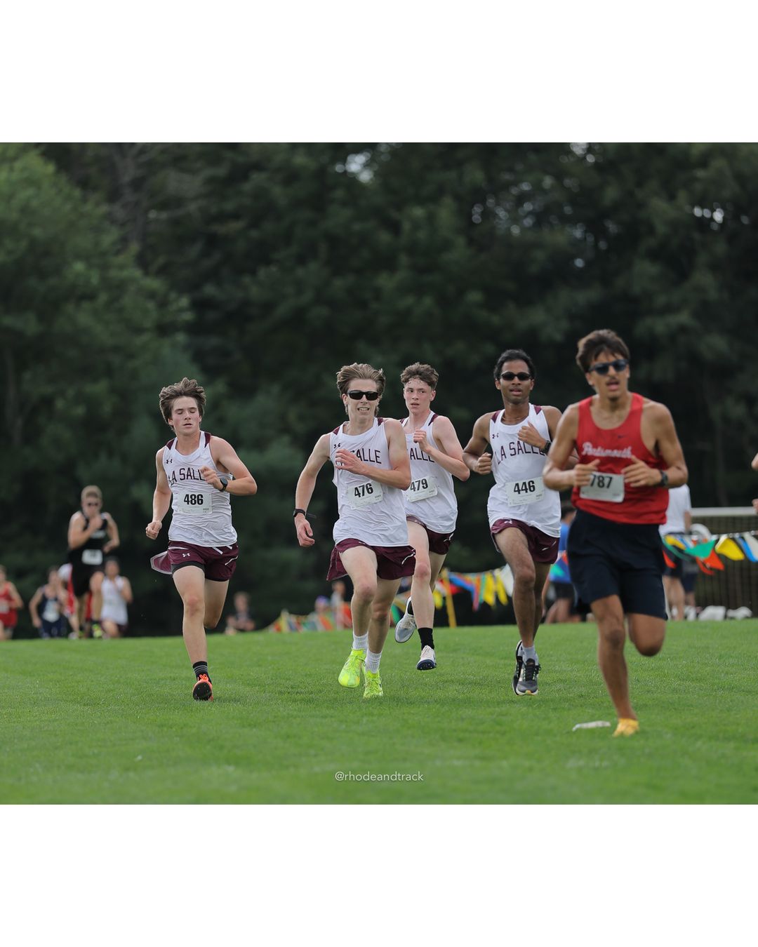 #476 Nick Scotti, La Salle Academy, 5k Run - Boys (Myers), P42, 20:06.71; #446 Ashwat Anand, La Salle Academy, 5k Run - Boys (Myers), P44, 20:07.38; #479 Gavin Skelly, La Salle Academy, 5k Run - Boys (Myers), P43, 20:07.16 - #187 Sienna Howley, Classical High School; #479 Gavin Skelly, La Salle Academy, 5k Run - Boys (Myers), P43, 20:07.16 - 2026 Injury Fund Carnival XC - Deerfield Park - Greenville, Rhode Island - September 05, 2026 File: ./dir-7-5k_Run-Boys-Myers/260905-2026-injury-fund-xc-deerfield-park-1211-398A9739.jpg #476 Nick Scotti, La Salle Academy, 5k Run - Boys (Myers), P42, 20:06.71; #446 Ashwat Anand, La Salle Academy, 5k Run - Boys (Myers), P44,…