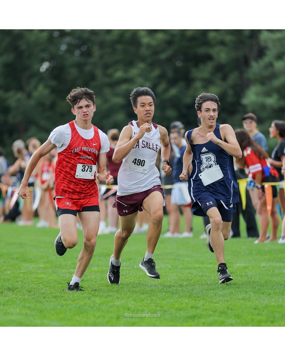 #490 Adee Yung, La Salle Academy, 5k Run - Boys (Myers), P48, 20:17.19 - #490 Adee Yung, La Salle Academy, 5k Run - Boys (Myers), P48, 20:17.19; #379 Ben Sousa, East Providence High School, 5k Run - Boys (Myers), P46, 20:16.61 - 2026 Injury Fund Carnival XC - Deerfield Park - Greenville, Rhode Island - September 05, 2026 File: ./dir-7-5k_Run-Boys-Myers/260905-2026-injury-fund-xc-deerfield-park-1217-398A9871.jpg #490 Adee Yung, La Salle Academy, 5k Run - Boys (Myers), P48, 20:17.19 - #490 Adee Yung, La Salle Academy, 5k Run - Boys (Myers), P48, 20:1…