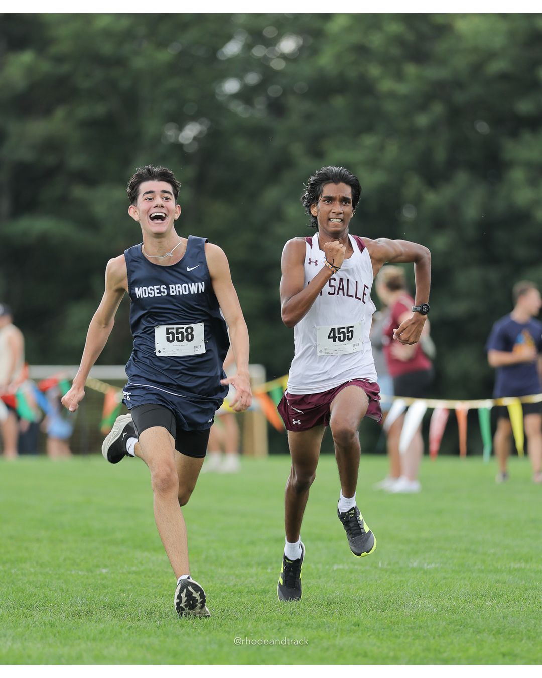 #558 Leiton Kraut, Moses Brown School, 5k Run - Boys (Myers), P70, 21:45.01; #455 Gilchrist Daniel, La Salle Academy, 5k Run - Boys (Myers), P69, 21:44.64 - #558 Leiton Kraut, Moses Brown School, 5k Run - Boys (Myers), P70, 21:45.01; #455 Gilchrist Daniel, La Salle Academy, 5k Run - Boys (Myers), P69, 21:44.64 - 2026 Injury Fund Carnival XC - Deerfield Park - Greenville, Rhode Island - September 05, 2026 File: ./dir-7-5k_Run-Boys-Myers/260905-2026-injury-fund-xc-deerfield-park-1237-398A0209.jpg #558 Leiton Kraut, Moses Brown School, 5k Run - Boys (Myers), P70, 21:45.01; #455 Gilchrist Daniel, La Salle Academy, 5k Run - Boys (Myers)…