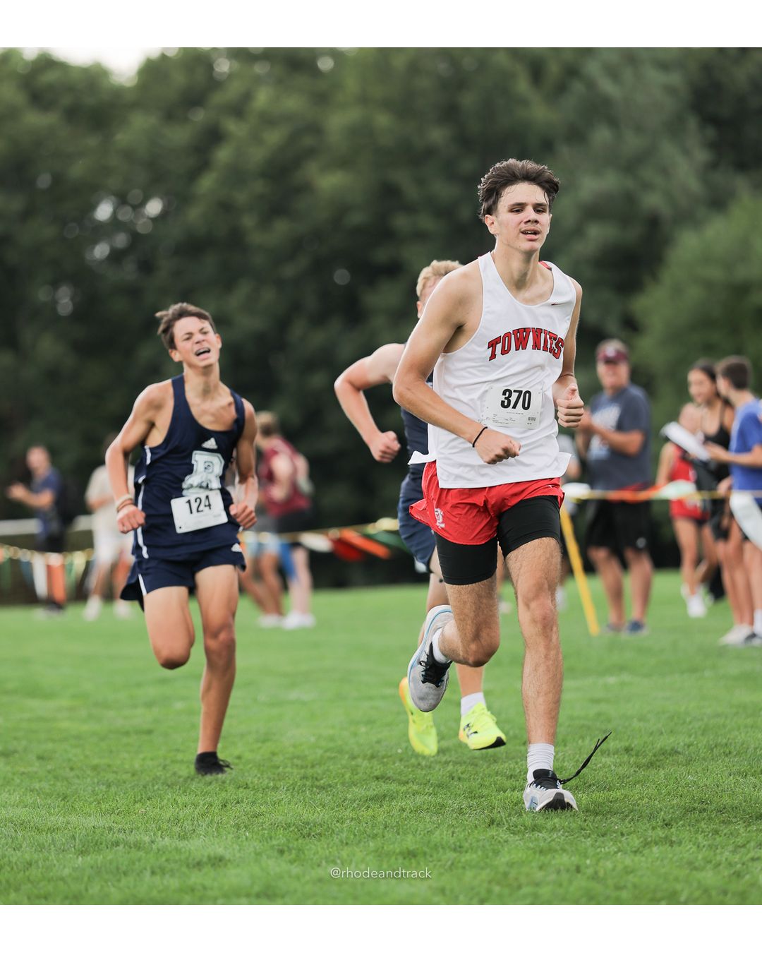 #370 Roman Lonardo, East Providence High School, 5k Run - Boys (Myers), P71, 21:48.16; #124 Luke Farrar, Burrillville High School, 5k Run - Boys (Myers), P73, 21:49.15 - #370 Roman Lonardo, East Providence High School, 5k Run - Boys (Myers), P71, 21:48.16; #124 Luke Farrar, Burrillville High School, 5k Run - Boys (Myers), P73, 21:49.15 - 2026 Injury Fund Carnival XC - Deerfield Park - Greenville, Rhode Island - September 05, 2026 File: ./dir-7-5k_Run-Boys-Myers/260905-2026-injury-fund-xc-deerfield-park-1239-398A0263.jpg #370 Roman Lonardo, East Providence High School, 5k Run - Boys (Myers), P71, 21:48.16; #124 Luke Farrar, Burrillville High School, 5k Run -…