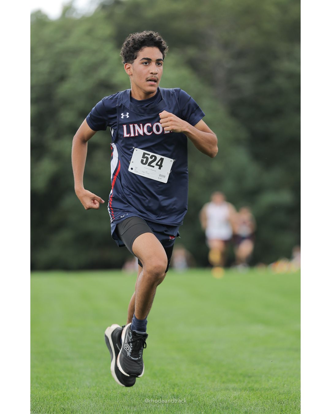 #524 Nicholas Moradel, Lincoln High School, 5k Run - Boys (Myers), P75, 22:02.99 - #524 Nicholas Moradel, Lincoln High School, 5k Run - Boys (Myers), P75, 22:02.99 - 2026 Injury Fund Carnival XC - Deerfield Park - Greenville, Rhode Island - September 05, 2026 File: ./dir-7-5k_Run-Boys-Myers/260905-2026-injury-fund-xc-deerfield-park-1242-398A0307.jpg #524 Nicholas Moradel, Lincoln High School, 5k Run - Boys (Myers), P75, 22:02.99 - #524 Nicholas Moradel, Lincoln High School, 5k Run - Boy…