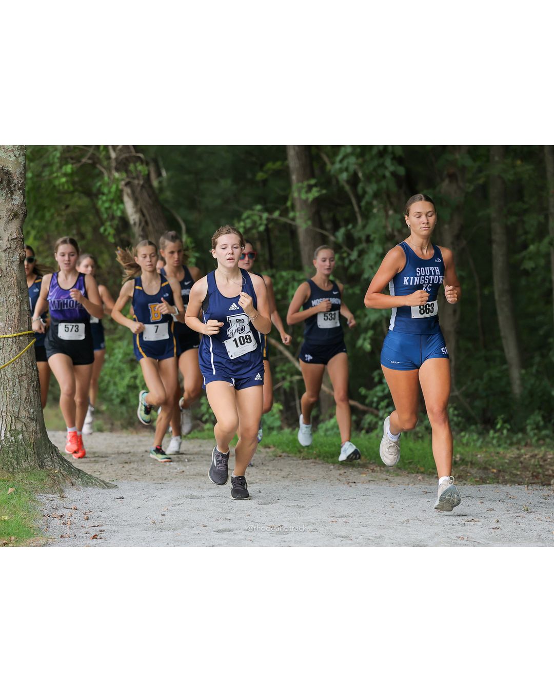 #109 Ellie Gobin, Burrillville High School, 5k Run - Girls (Caswell), P25, 24:18.33 - #109 Ellie Gobin, Burrillville High School, 5k Run - Girls (Caswell), P25, 24:18.33; #573 Evelyn Towers, Mount Hope High School, 5k Run - Girls (Caswell), P21, 23:19.09 - 2026 Injury Fund Carnival XC - Deerfield Park - Greenville, Rhode Island - September 05, 2026 File: ./dir-8-5k_Run-Girls-Caswell/260905-2026-injury-fund-xc-deerfield-park-1285-398A0958.jpg #109 Ellie Gobin, Burrillville High School, 5k Run - Girls (Caswell), P25, 24:18.33 - #109 Ellie Gobin, Burrillville High School, 5k Run -…