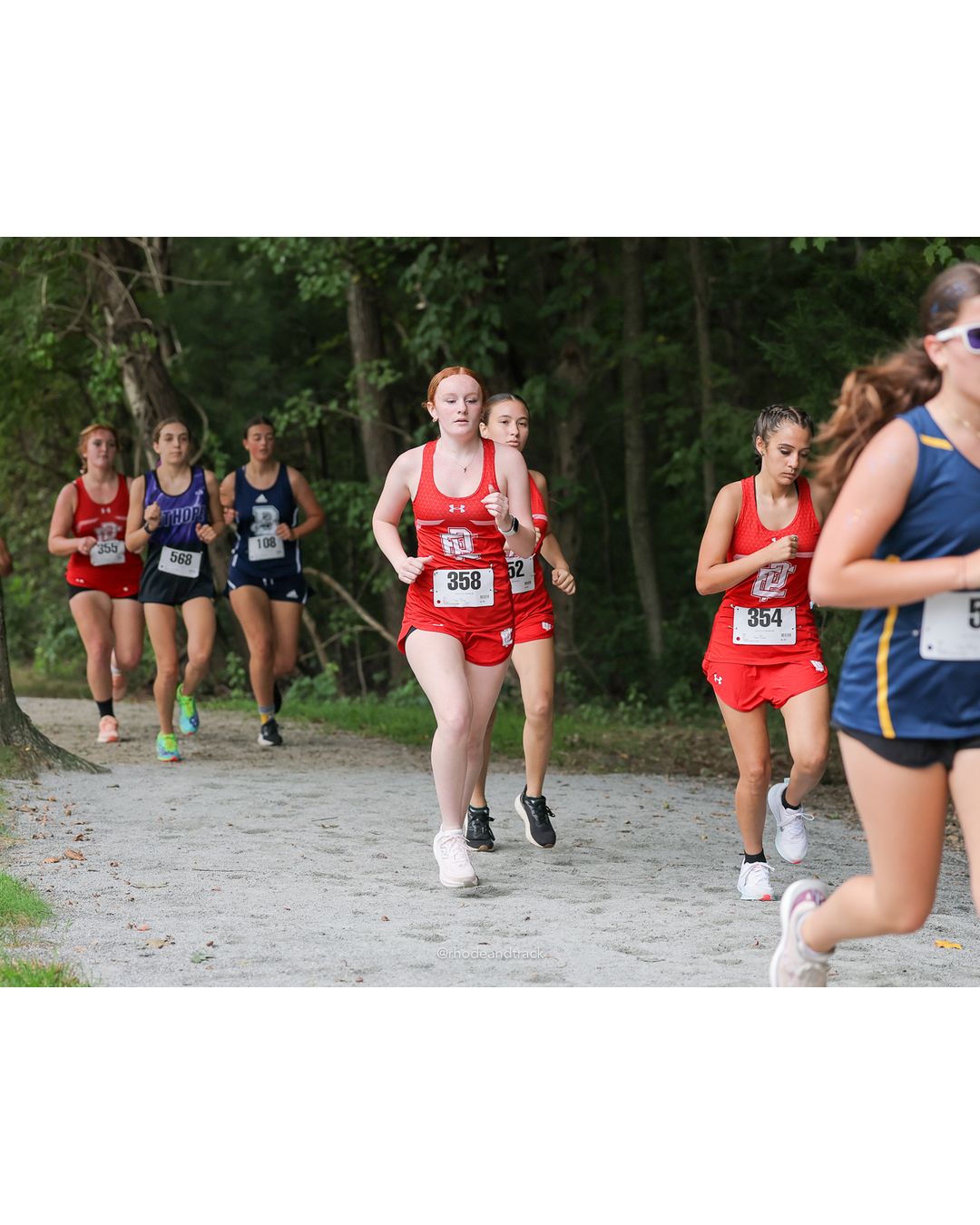 #358 Margaret Thomson, East Providence High School, 5k Run - Girls (Caswell), P45, 28:12.73; #354 Stella Nunez, East Providence High School, 5k Run - Girls (Caswell), P56, 30:51.24; #568 Ellie Donovan, Mount Hope High School, 5k Run - Girls (Caswell), P55, 30:09.11 - #358 Margaret Thomson, East Providence High School, 5k Run - Girls (Caswell), P45, 28:12.73; #354 Stella Nunez, East Providence High School, 5k Run - Girls (Caswell), P56, 30:51.24; #568 Ellie Donovan, Mount Hope High School, 5k Run - Girls (Caswell), P55, 30:09.11 - 2026 Injury Fund Carnival XC - Deerfield Park - Greenville, Rhode Island - September 05, 2026 File: ./dir-8-5k_Run-Girls-Caswell/260905-2026-injury-fund-xc-deerfield-park-1300-398A1159.jpg #358 Margaret Thomson, East Providence High School, 5k Run - Girls (Caswell), P45, 28:12.73; #354 Stella Nunez, East Providence High School…