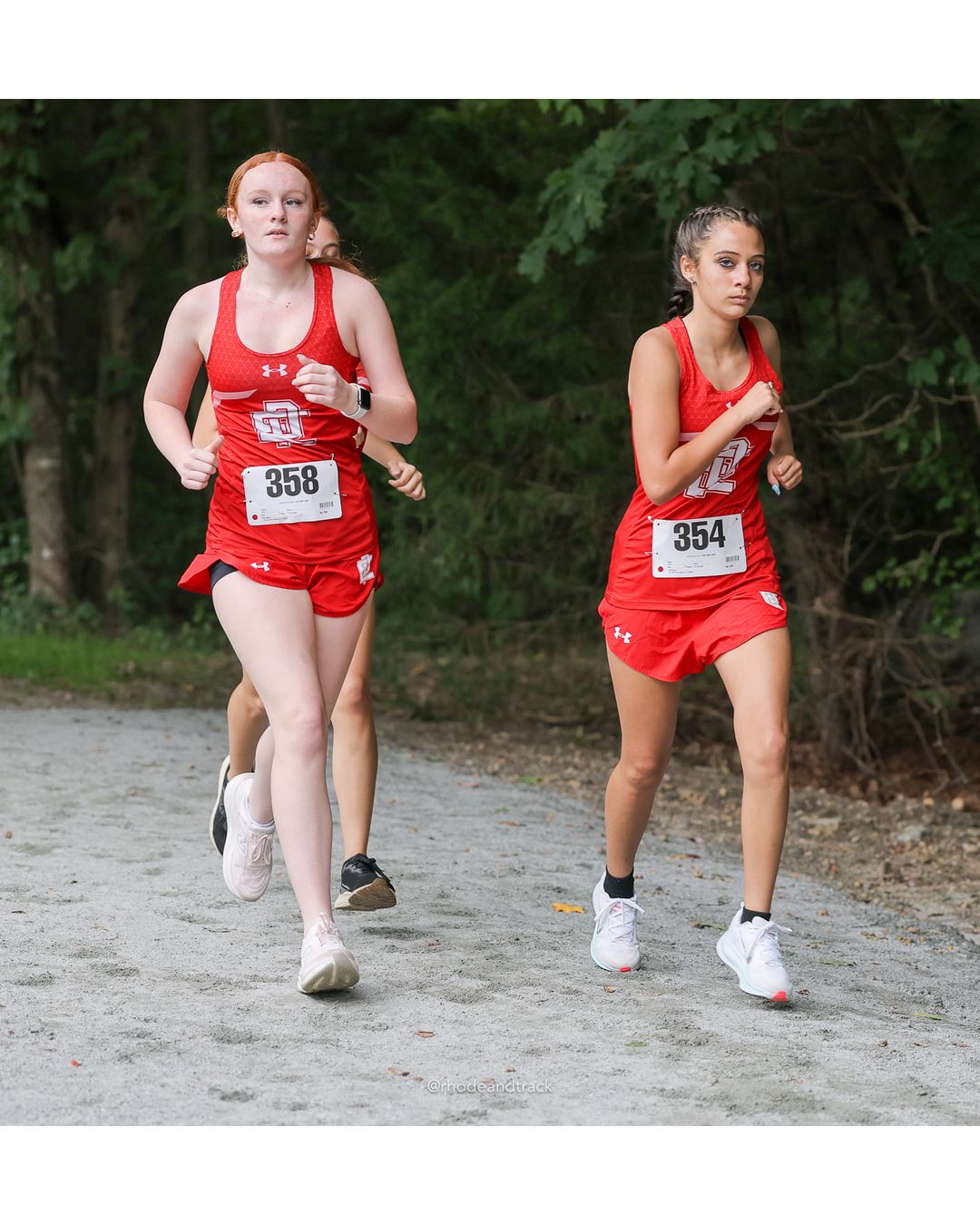 #358 Margaret Thomson, East Providence High School, 5k Run - Girls (Caswell), P45, 28:12.73; #354 Stella Nunez, East Providence High School, 5k Run - Girls (Caswell), P56, 30:51.24 - #354 Stella Nunez, East Providence High School, 5k Run - Girls (Caswell), P56, 30:51.24; #358 Margaret Thomson, East Providence High School, 5k Run - Girls (Caswell), P45, 28:12.73 - 2026 Injury Fund Carnival XC - Deerfield Park - Greenville, Rhode Island - September 05, 2026 File: ./dir-8-5k_Run-Girls-Caswell/260905-2026-injury-fund-xc-deerfield-park-1301-398A1167.jpg #358 Margaret Thomson, East Providence High School, 5k Run - Girls (Caswell), P45, 28:12.73; #354 Stella Nunez, East Providence High School…