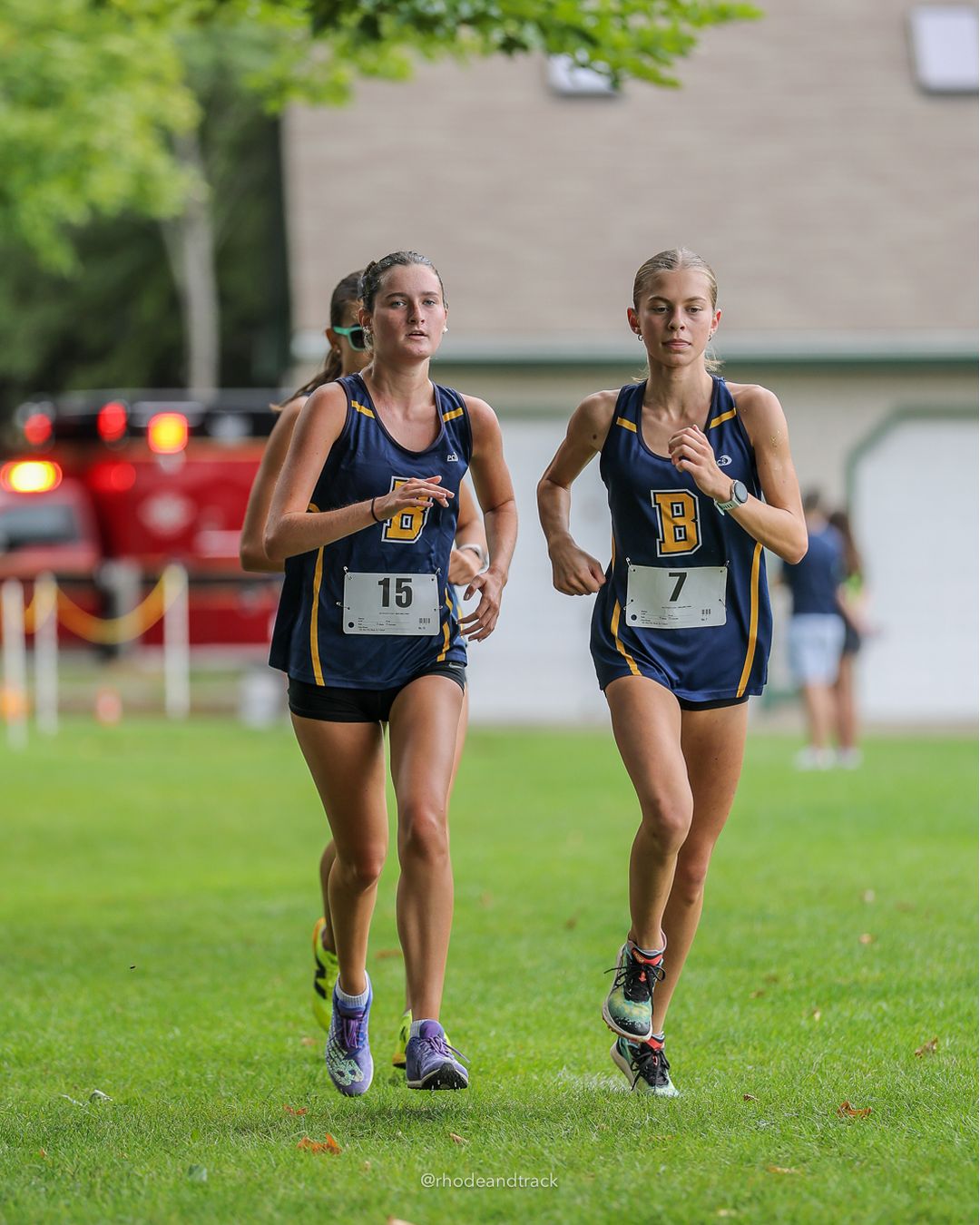 #19 Rose Rakeman, Barrington High School, 5k Run - Girls (Caswell), P30, 25:10.05; #15 Estelle Mentzer, Barrington High School, 5k Run - Girls (Caswell), P11, 21:58.30 - 2026 Injury Fund Carnival XC - Deerfield Park - Greenville, Rhode Island - September 05, 2026 File: ./dir-8-5k_Run-Girls-Caswell/260905-2026-injury-fund-xc-deerfield-park-1340-398A1387.jpg #19 Rose Rakeman, Barrington High School, 5k Run - Girls (Caswell), P30, 25:10.05; #15 Estelle Mentzer, Barrington High School, 5k Run - Gi…