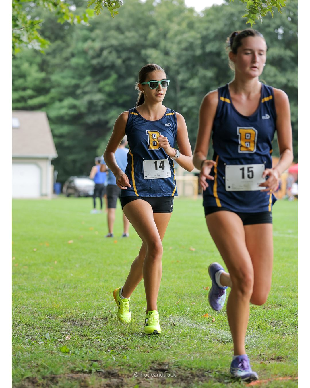 #15 Estelle Mentzer, Barrington High School, 5k Run - Girls (Caswell), P11, 21:58.30 - #15 Estelle Mentzer, Barrington High School, 5k Run - Girls (Caswell), P11, 21:58.30; #14 Elsa Mello, Barrington High School, 5k Run - Girls (Caswell), P12, 21:58.77 - 2026 Injury Fund Carnival XC - Deerfield Park - Greenville, Rhode Island - September 05, 2026 File: ./dir-8-5k_Run-Girls-Caswell/260905-2026-injury-fund-xc-deerfield-park-1343-398A1508.jpg #15 Estelle Mentzer, Barrington High School, 5k Run - Girls (Caswell), P11, 21:58.30 - #15 Estelle Mentzer, Barrington High School, 5k Run…