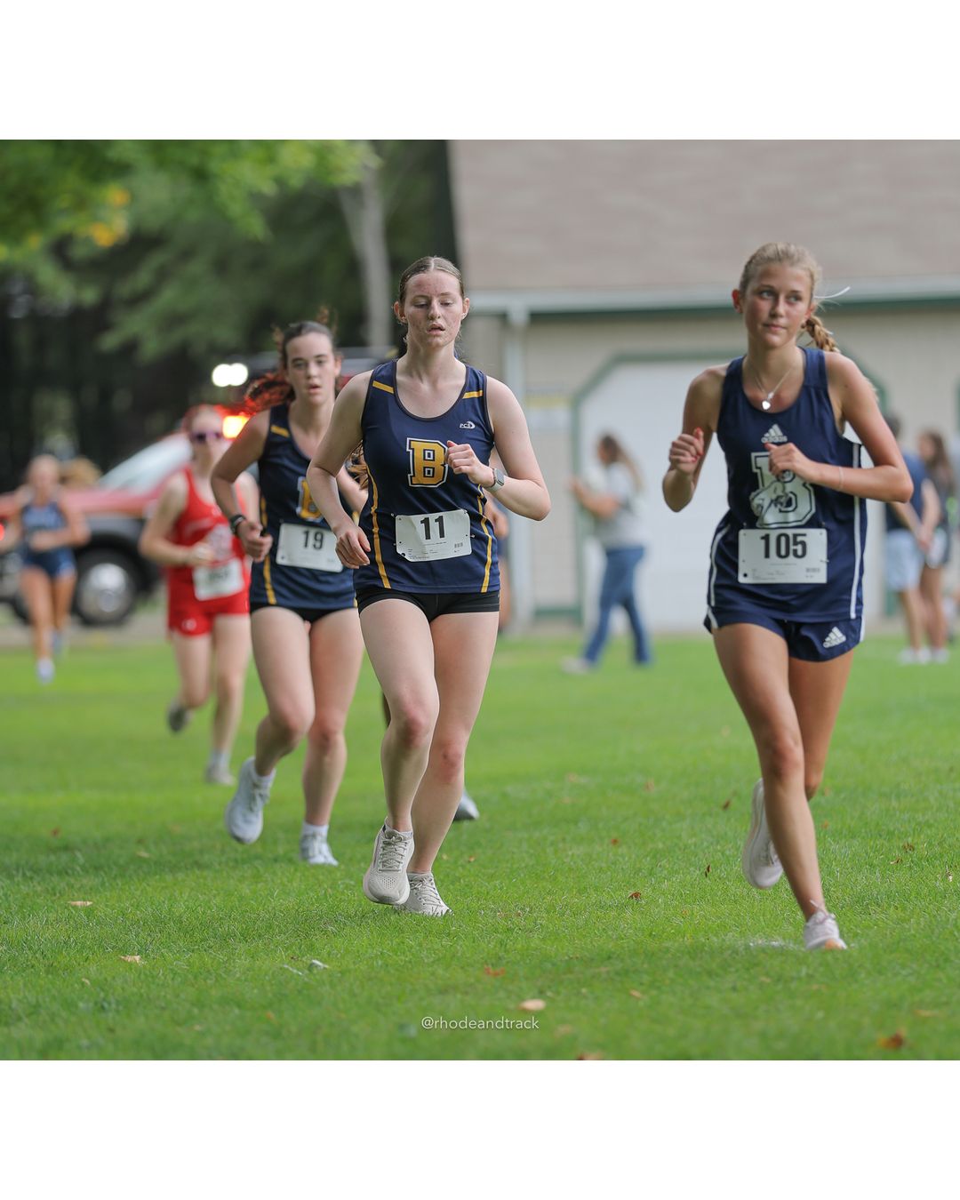 #11 Sophie Halloran, Barrington High School, 5k Run - Girls (Caswell), P32, 25:29.91 - #105 Natalie Ducharme, Burrillville High School, 5k Run - Girls (Caswell), P31, 25:12.74; #19 Rose Rakeman, Barrington High School, 5k Run - Girls (Caswell), P30, 25:10.05 - 2026 Injury Fund Carnival XC - Deerfield Park - Greenville, Rhode Island - September 05, 2026 File: ./dir-8-5k_Run-Girls-Caswell/260905-2026-injury-fund-xc-deerfield-park-1359-398A1750_1.jpg #11 Sophie Halloran, Barrington High School, 5k Run - Girls (Caswell), P32, 25:29.91 - #105 Natalie Ducharme, Burrillville High School, 5k…