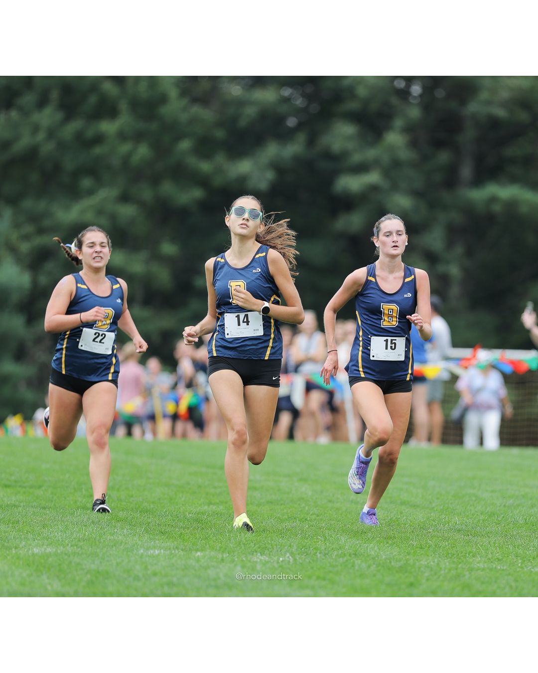 #15 Estelle Mentzer, Barrington High School, 5k Run - Girls (Caswell), P11, 21:58.30 - #14 Elsa Mello, Barrington High School, 5k Run - Girls (Caswell), P12, 21:58.77; #15 Estelle Mentzer, Barrington High School, 5k Run - Girls (Caswell), P11, 21:58.30 - 2026 Injury Fund Carnival XC - Deerfield Park - Greenville, Rhode Island - September 05, 2026 File: ./dir-8-5k_Run-Girls-Caswell/260905-2026-injury-fund-xc-deerfield-park-1401-398A2455.jpg #15 Estelle Mentzer, Barrington High School, 5k Run - Girls (Caswell), P11, 21:58.30 - #14 Elsa Mello, Barrington High School, 5k Run - Gir…
