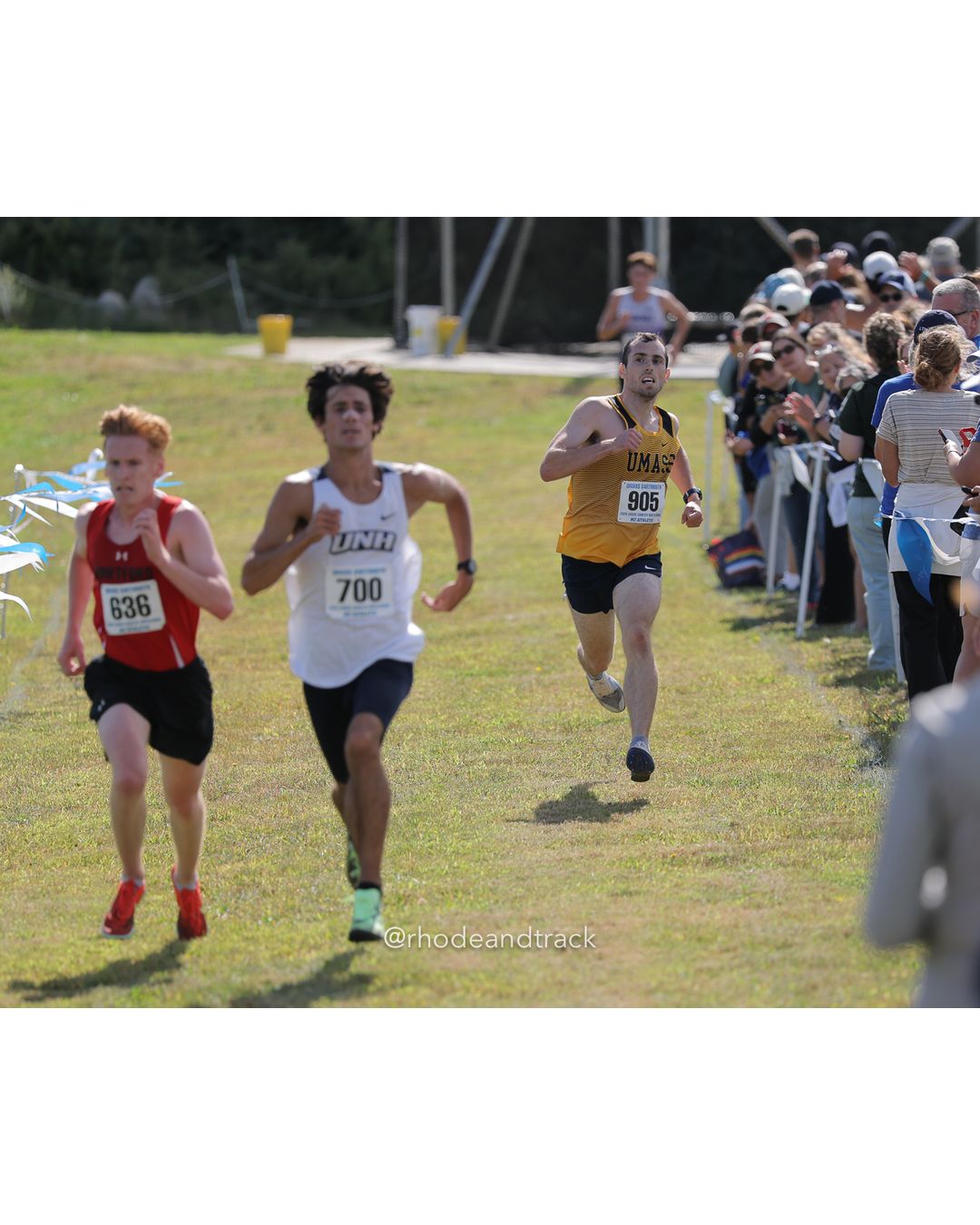 #636 Keller Casey, Hartford, 8k Run - Men (Navy-45:cap), P18, 26:31.79; #700 Lucas Archer, New Hampshire, 8k Run - Men (Navy-45:cap), P17, 26:31.56; #905 Ethan Sylvia, UMD Alumni, 8k Run - Men (Navy-45:cap), P19, 26:32.90 - 2026 UMass Dartmouth XC Invitational - UMass Dartmouth - Dartmouth, Massachusetts - September 19, 2026 File: ./260919-2026-UMass-Dartmouth-XC-Invitational-10-398A3803.jpg #636 Keller Casey, Hartford, 8k Run - Men (Navy-45:cap), P18, 26:31.79; #700 Lucas Archer, New Hampshire, 8k Run - Men (Navy-45:cap), P17,…