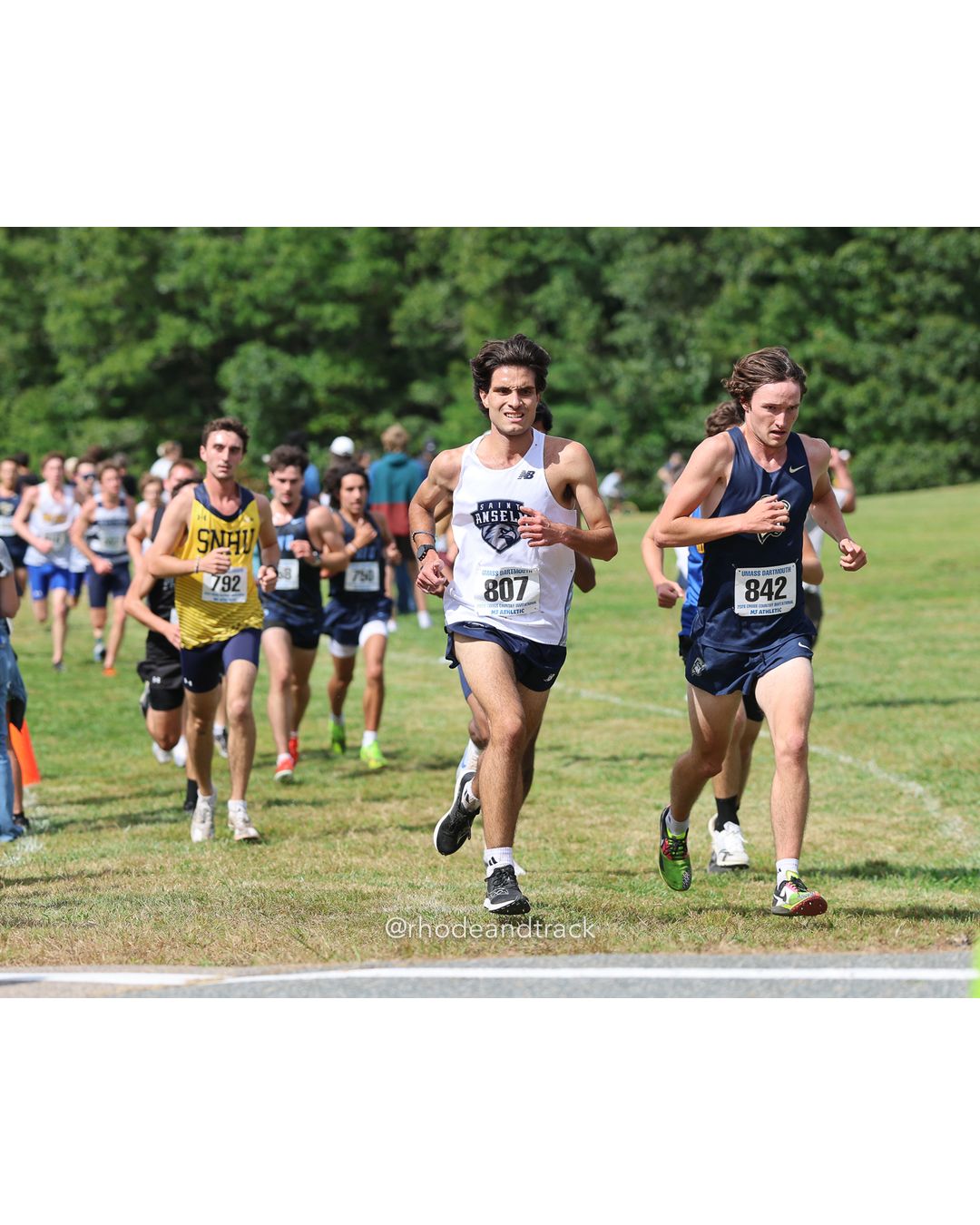#842 Declan Shannon, Suffolk, 8k Run - Men (Gold-35:cap), P165, 28:14.84; #807 Diego Infante, St. Anselm, 8k Run - Men (Gold-35:cap), P178, 28:38.11 - 2026 UMass Dartmouth XC Invitational - UMass Dartmouth - Dartmouth, Massachusetts - September 19, 2026 File: ./260919-2026-UMass-Dartmouth-XC-Invitational-107-398A5548.jpg #842 Declan Shannon, Suffolk, 8k Run - Men (Gold-35:cap), P165, 28:14.84; #807 Diego Infante, St. Anselm, 8k Run - Men (Gold-35:cap), P178,…